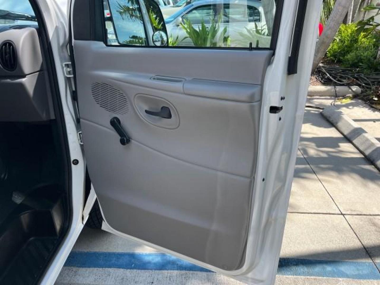 2000 Oxford White /Medium Graphite Ford Econoline Cargo Van LOW MILES 56,367 (1FTRE1427YH) with an 4.2L SEFI SPI V6 Engine engine, Automatic transmission, located at 4701 North Dixie Hwy, Pompano Beach, FL, 33064, (954) 422-2889, 26.240938, -80.123474 - OUR WEBPAGE FLORIDACARS1.COM HAS OVER 100 PHOTOS AND FREE CARFAX LINK 2000 FORD E-150 ROAD READY WORK READY VIN: 1FTRE1427YHB14150 NO ACCIDENTS NO RECALLS VAN 1 OWNER 4.2L V6 4.2L V6 F SOHC LOW MILES 56,367 GASOLINE REAR WHEEL DRIVE Approach Lights Front Bucket Seats RWD THIS IS ONE OF THE NICEST FO - Photo#24