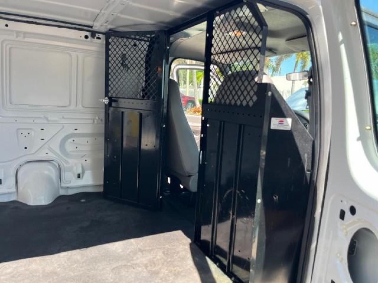 2000 Oxford White /Medium Graphite Ford Econoline Cargo Van LOW MILES 56,367 (1FTRE1427YH) with an 4.2L SEFI SPI V6 Engine engine, Automatic transmission, located at 4701 North Dixie Hwy, Pompano Beach, FL, 33064, (954) 422-2889, 26.240938, -80.123474 - OUR WEBPAGE FLORIDACARS1.COM HAS OVER 100 PHOTOS AND FREE CARFAX LINK 2000 FORD E-150 ROAD READY WORK READY VIN: 1FTRE1427YHB14150 NO ACCIDENTS NO RECALLS VAN 1 OWNER 4.2L V6 4.2L V6 F SOHC LOW MILES 56,367 GASOLINE REAR WHEEL DRIVE Approach Lights Front Bucket Seats RWD THIS IS ONE OF THE NICEST FO - Photo#31