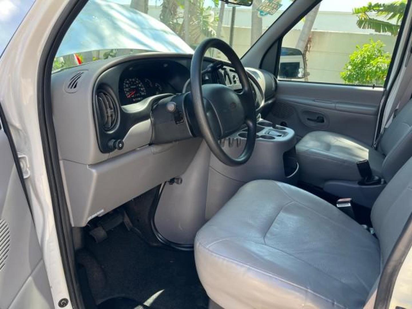 2000 Oxford White /Medium Graphite Ford Econoline Cargo Van LOW MILES 56,367 (1FTRE1427YH) with an 4.2L SEFI SPI V6 Engine engine, Automatic transmission, located at 4701 North Dixie Hwy, Pompano Beach, FL, 33064, (954) 422-2889, 26.240938, -80.123474 - OUR WEBPAGE FLORIDACARS1.COM HAS OVER 100 PHOTOS AND FREE CARFAX LINK 2000 FORD E-150 ROAD READY WORK READY VIN: 1FTRE1427YHB14150 NO ACCIDENTS NO RECALLS VAN 1 OWNER 4.2L V6 4.2L V6 F SOHC LOW MILES 56,367 GASOLINE REAR WHEEL DRIVE Approach Lights Front Bucket Seats RWD THIS IS ONE OF THE NICEST FO - Photo#44