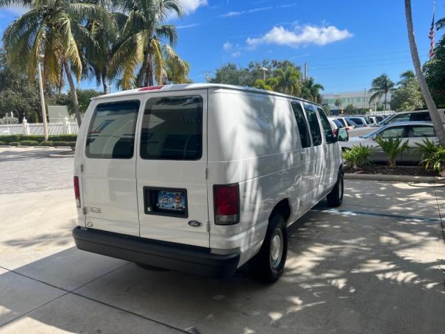 2000 Oxford White /Medium Graphite Ford Econoline Cargo Van LOW MILES 56,367 (1FTRE1427YH) with an 4.2L SEFI SPI V6 Engine engine, Automatic transmission, located at 4701 North Dixie Hwy, Pompano Beach, FL, 33064, (954) 422-2889, 26.240938, -80.123474 - OUR WEBPAGE FLORIDACARS1.COM HAS OVER 100 PHOTOS AND FREE CARFAX LINK 2000 FORD E-150 ROAD READY WORK READY VIN: 1FTRE1427YHB14150 NO ACCIDENTS NO RECALLS VAN 1 OWNER 4.2L V6 4.2L V6 F SOHC LOW MILES 56,367 GASOLINE REAR WHEEL DRIVE Approach Lights Front Bucket Seats RWD THIS IS ONE OF THE NICEST FO - Photo#7