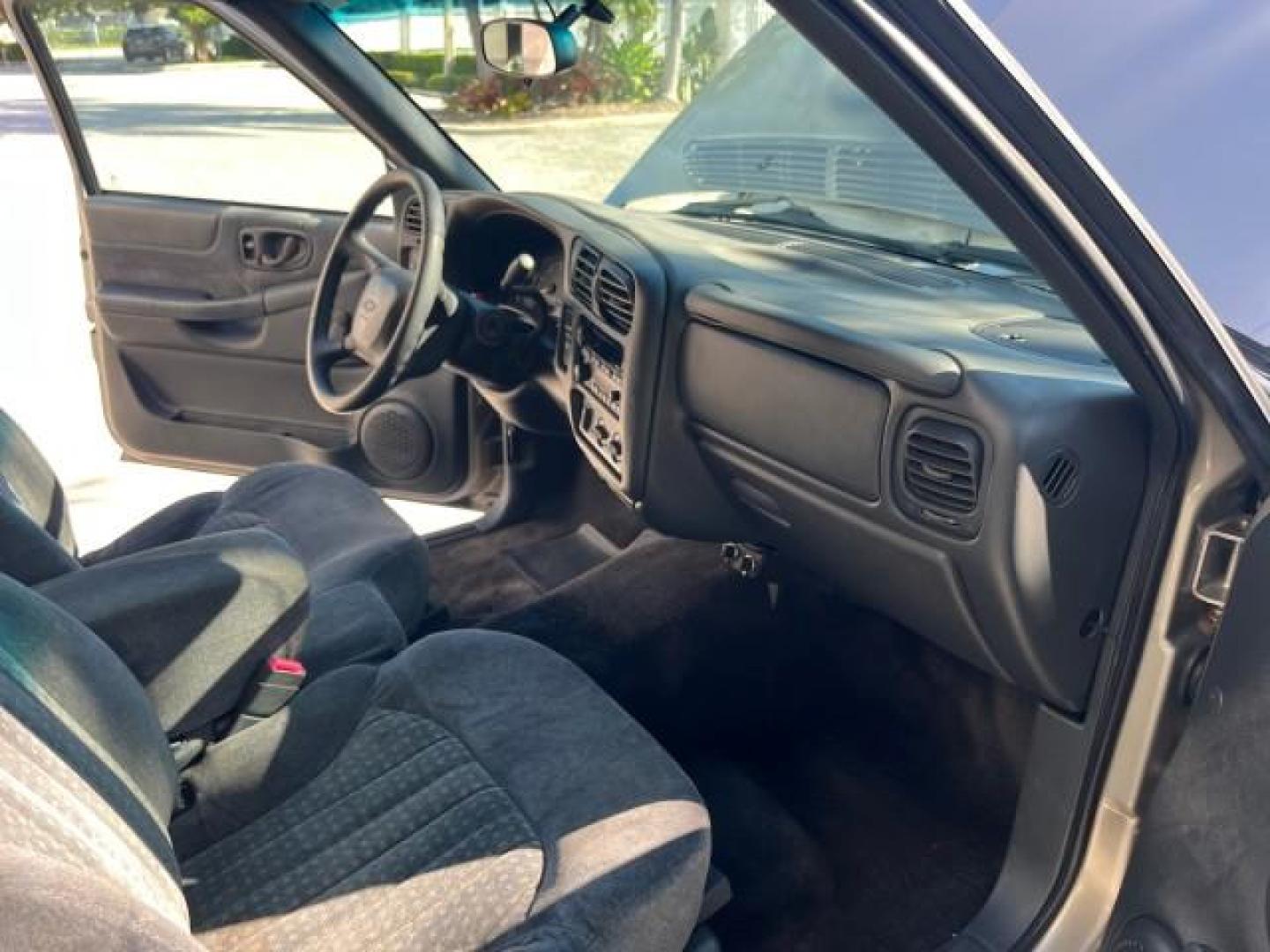 2002 Light Pewter Metallic /Graphite Chevrolet S-10 X CAB V6 LS LOW MILES 70,955 (1GCCS19W428) with an 4.3L Vortec 1000 SFI V6 Engine engine, Automatic transmission, located at 4701 North Dixie Hwy, Pompano Beach, FL, 33064, (954) 422-2889, 26.240938, -80.123474 - OUR WEBPAGE FLORIDACARS1.COM HAS OVER 100 PHOTOS AND FREE CARFAX LINK 2002 CHEVROLET S-10 ROAD READY 4.3L V6 VIN: 1GCCS19W428244386N NO ACCIDENTS 3 DOOR EXTENDED CAB PICKUP NO RECALLS 6.1 FT BED 4.3L V6 F OHV 12V FLORIDA OWNER GASOLINE LOW MILES 70,955 REAR WHEEL DRIVE WORK READY .1' Bed Length Anti - Photo#26