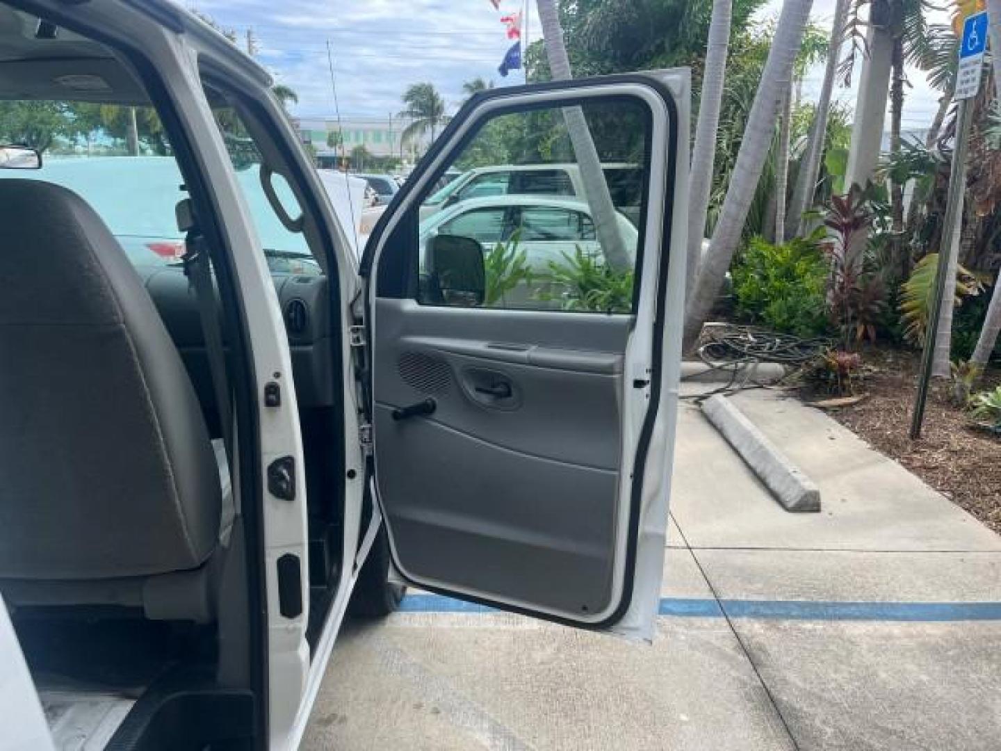 2006 Oxford White /Medium Flint Ford Econoline Cargo Van 1 FL LOW MILES 72,407 (1FTRE14W76D) with an 4.6L SOHC EFI V8 Triton Engine engine, Automatic transmission, located at 4701 North Dixie Hwy, Pompano Beach, FL, 33064, (954) 422-2889, 26.240938, -80.123474 - OUR WEBPAGE FLORIDACARS1.COM HAS OVER 100 PHOTOS AND FREE CARFAX LINK 2006 FORD E-SERIES E-150 ROAD READY WORK READY VIN: 1FTRE14W76DA47721 NO ACCIDENTS NO RECALLS VAN 13 SERVICE RECORDS 4.6L V8 F 1 OWNER FLORIDA GASOLINE LOW MILES 72,407 4.6L V8 REAR WHEEL DRIVE Engine Block Heater Leather Seats Sa - Photo#11