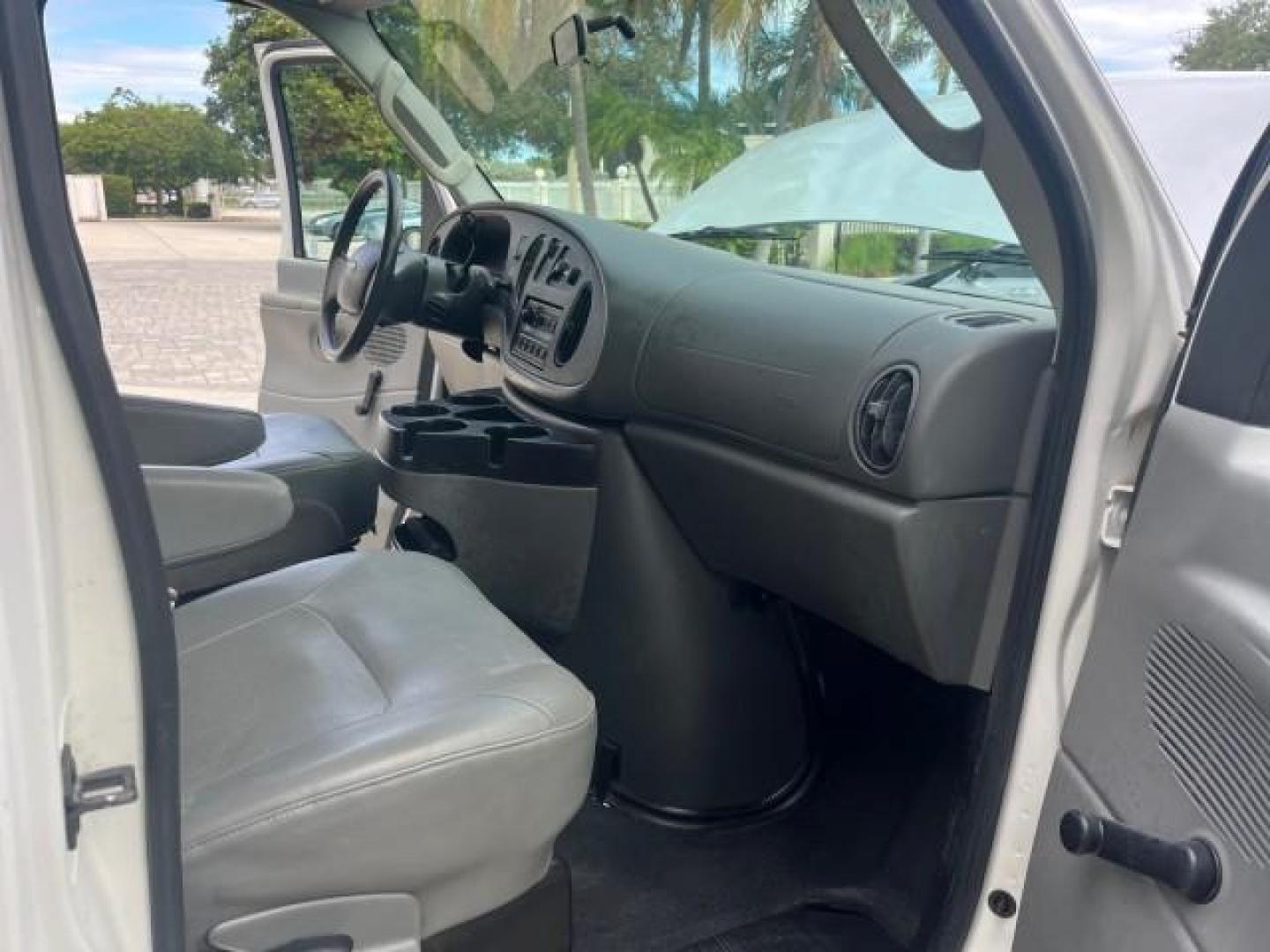 2006 Oxford White /Medium Flint Ford Econoline Cargo Van 1 FL LOW MILES 72,407 (1FTRE14W76D) with an 4.6L SOHC EFI V8 Triton Engine engine, Automatic transmission, located at 4701 North Dixie Hwy, Pompano Beach, FL, 33064, (954) 422-2889, 26.240938, -80.123474 - OUR WEBPAGE FLORIDACARS1.COM HAS OVER 100 PHOTOS AND FREE CARFAX LINK 2006 FORD E-SERIES E-150 ROAD READY WORK READY VIN: 1FTRE14W76DA47721 NO ACCIDENTS NO RECALLS VAN 13 SERVICE RECORDS 4.6L V8 F 1 OWNER FLORIDA GASOLINE LOW MILES 72,407 4.6L V8 REAR WHEEL DRIVE Engine Block Heater Leather Seats Sa - Photo#24