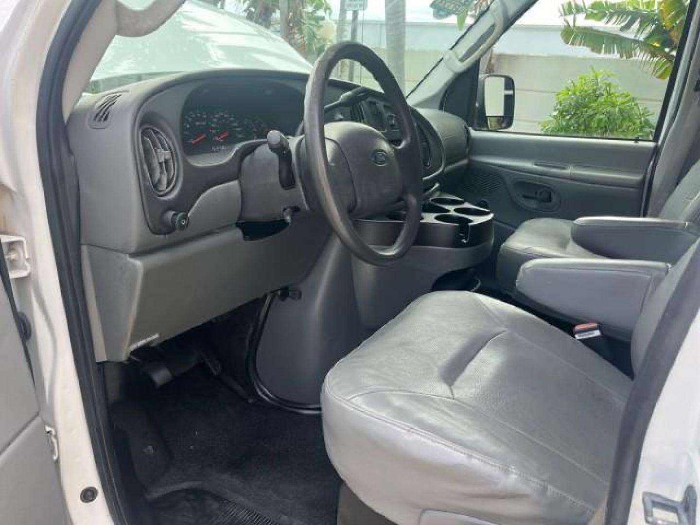 2006 Oxford White /Medium Flint Ford Econoline Cargo Van 1 FL LOW MILES 72,407 (1FTRE14W76D) with an 4.6L SOHC EFI V8 Triton Engine engine, Automatic transmission, located at 4701 North Dixie Hwy, Pompano Beach, FL, 33064, (954) 422-2889, 26.240938, -80.123474 - OUR WEBPAGE FLORIDACARS1.COM HAS OVER 100 PHOTOS AND FREE CARFAX LINK 2006 FORD E-SERIES E-150 ROAD READY WORK READY VIN: 1FTRE14W76DA47721 NO ACCIDENTS NO RECALLS VAN 13 SERVICE RECORDS 4.6L V8 F 1 OWNER FLORIDA GASOLINE LOW MILES 72,407 4.6L V8 REAR WHEEL DRIVE Engine Block Heater Leather Seats Sa - Photo#31