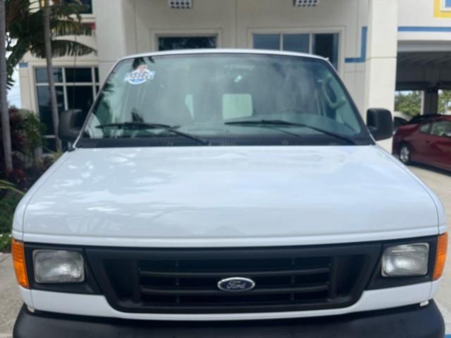 2006 Oxford White /Medium Flint Ford Econoline Cargo Van 1 FL LOW MILES 72,407 (1FTRE14W76D) with an 4.6L SOHC EFI V8 Triton Engine engine, Automatic transmission, located at 4701 North Dixie Hwy, Pompano Beach, FL, 33064, (954) 422-2889, 26.240938, -80.123474 - OUR WEBPAGE FLORIDACARS1.COM HAS OVER 100 PHOTOS AND FREE CARFAX LINK 2006 FORD E-SERIES E-150 ROAD READY WORK READY VIN: 1FTRE14W76DA47721 NO ACCIDENTS NO RECALLS VAN 13 SERVICE RECORDS 4.6L V8 F 1 OWNER FLORIDA GASOLINE LOW MILES 72,407 4.6L V8 REAR WHEEL DRIVE Engine Block Heater Leather Seats Sa - Photo#52