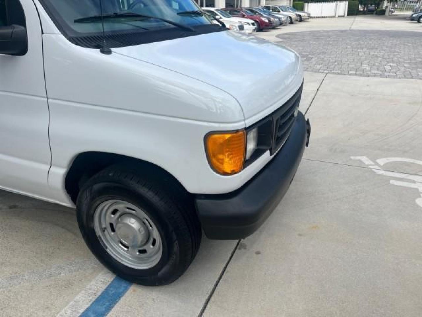 2006 Oxford White /Medium Flint Ford Econoline Cargo Van 1 FL LOW MILES 72,407 (1FTRE14W76D) with an 4.6L SOHC EFI V8 Triton Engine engine, Automatic transmission, located at 4701 North Dixie Hwy, Pompano Beach, FL, 33064, (954) 422-2889, 26.240938, -80.123474 - OUR WEBPAGE FLORIDACARS1.COM HAS OVER 100 PHOTOS AND FREE CARFAX LINK 2006 FORD E-SERIES E-150 ROAD READY WORK READY VIN: 1FTRE14W76DA47721 NO ACCIDENTS NO RECALLS VAN 13 SERVICE RECORDS 4.6L V8 F 1 OWNER FLORIDA GASOLINE LOW MILES 72,407 4.6L V8 REAR WHEEL DRIVE Engine Block Heater Leather Seats Sa - Photo#59