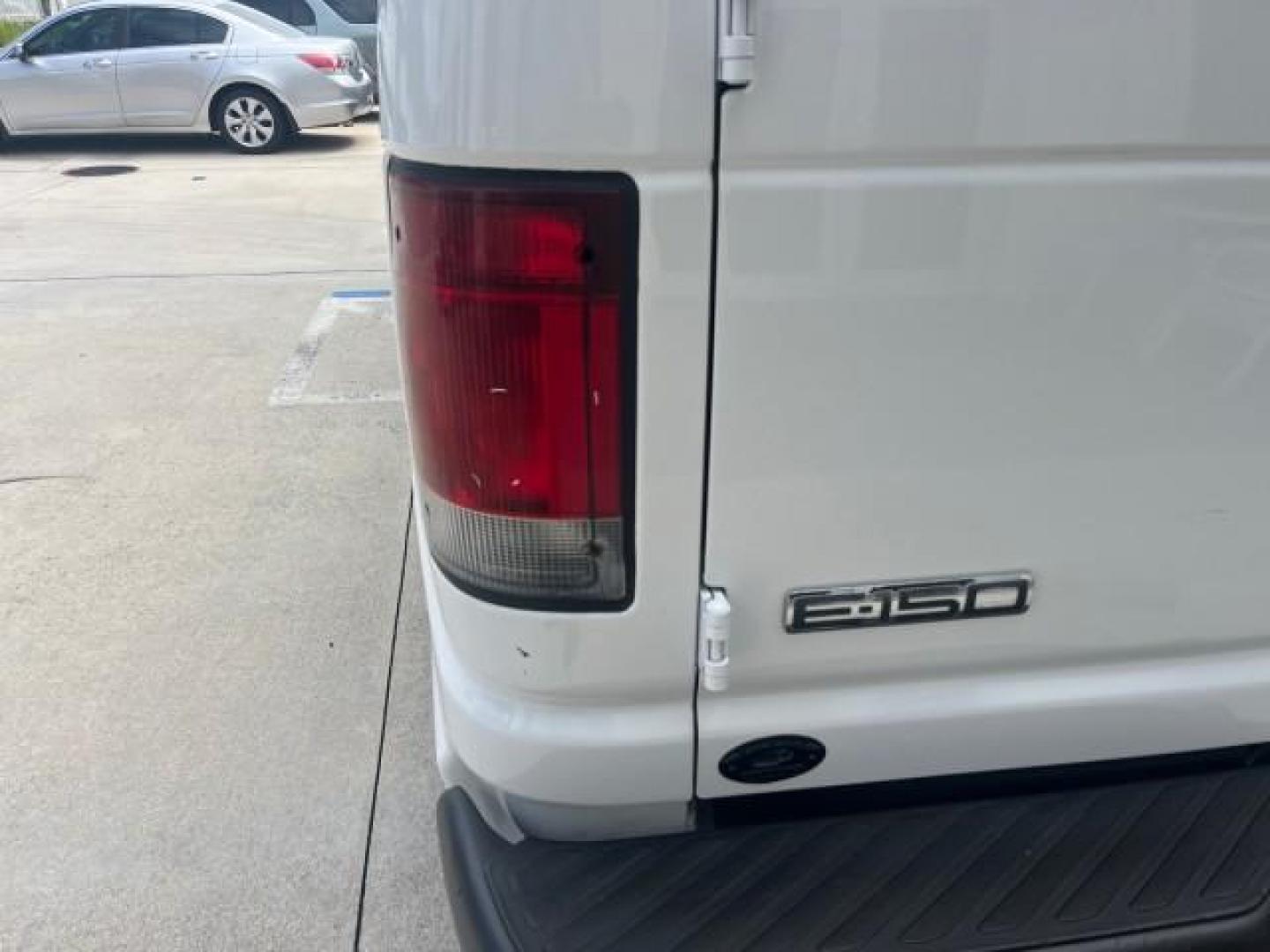 2006 Oxford White /Medium Flint Ford Econoline Cargo Van 1 FL LOW MILES 72,407 (1FTRE14W76D) with an 4.6L SOHC EFI V8 Triton Engine engine, Automatic transmission, located at 4701 North Dixie Hwy, Pompano Beach, FL, 33064, (954) 422-2889, 26.240938, -80.123474 - OUR WEBPAGE FLORIDACARS1.COM HAS OVER 100 PHOTOS AND FREE CARFAX LINK 2006 FORD E-SERIES E-150 ROAD READY WORK READY VIN: 1FTRE14W76DA47721 NO ACCIDENTS NO RECALLS VAN 13 SERVICE RECORDS 4.6L V8 F 1 OWNER FLORIDA GASOLINE LOW MILES 72,407 4.6L V8 REAR WHEEL DRIVE Engine Block Heater Leather Seats Sa - Photo#71