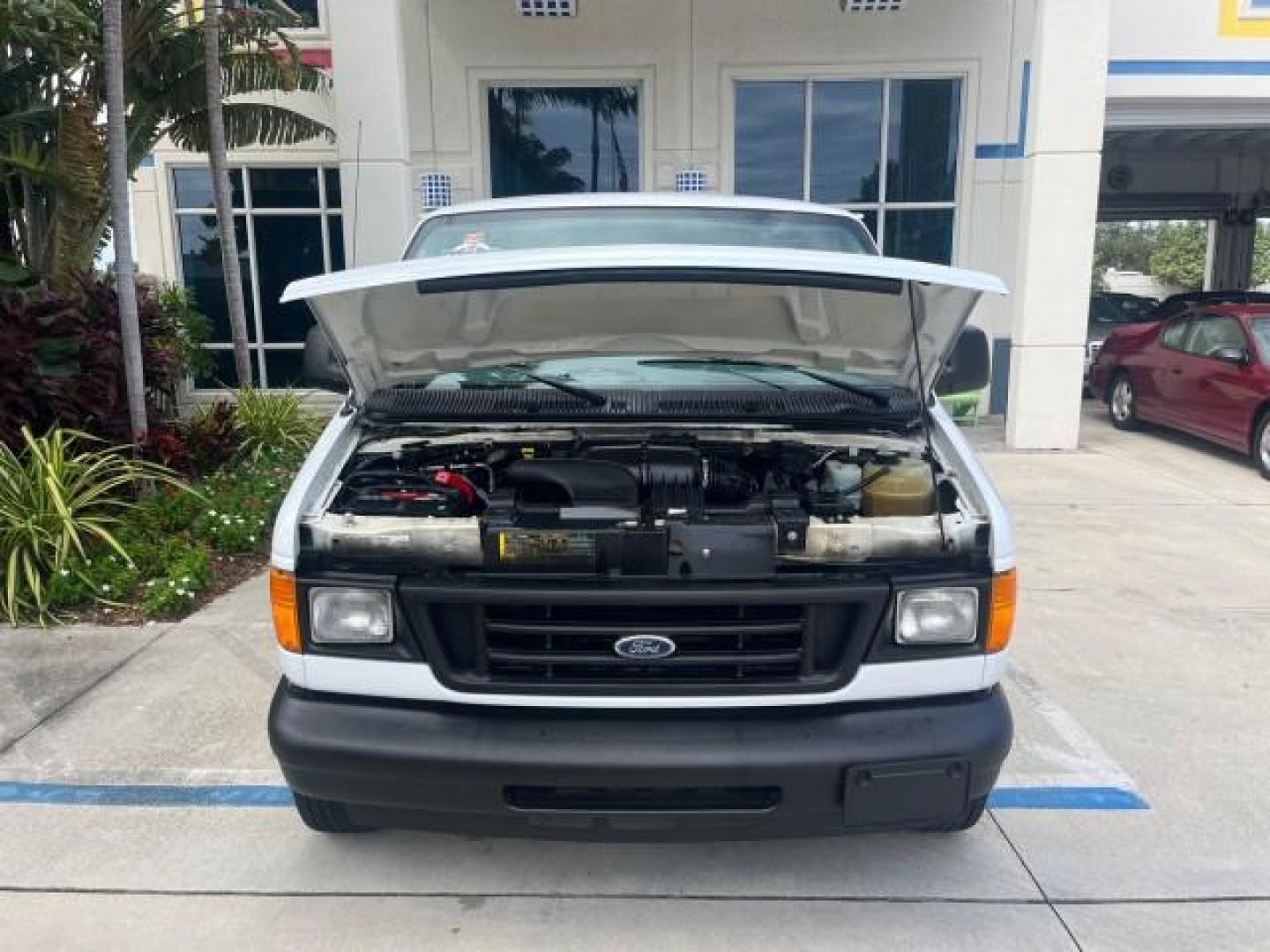2006 Oxford White /Medium Flint Ford Econoline Cargo Van 1 FL LOW MILES 72,407 (1FTRE14W76D) with an 4.6L SOHC EFI V8 Triton Engine engine, Automatic transmission, located at 4701 North Dixie Hwy, Pompano Beach, FL, 33064, (954) 422-2889, 26.240938, -80.123474 - OUR WEBPAGE FLORIDACARS1.COM HAS OVER 100 PHOTOS AND FREE CARFAX LINK 2006 FORD E-SERIES E-150 ROAD READY WORK READY VIN: 1FTRE14W76DA47721 NO ACCIDENTS NO RECALLS VAN 13 SERVICE RECORDS 4.6L V8 F 1 OWNER FLORIDA GASOLINE LOW MILES 72,407 4.6L V8 REAR WHEEL DRIVE Engine Block Heater Leather Seats Sa - Photo#43