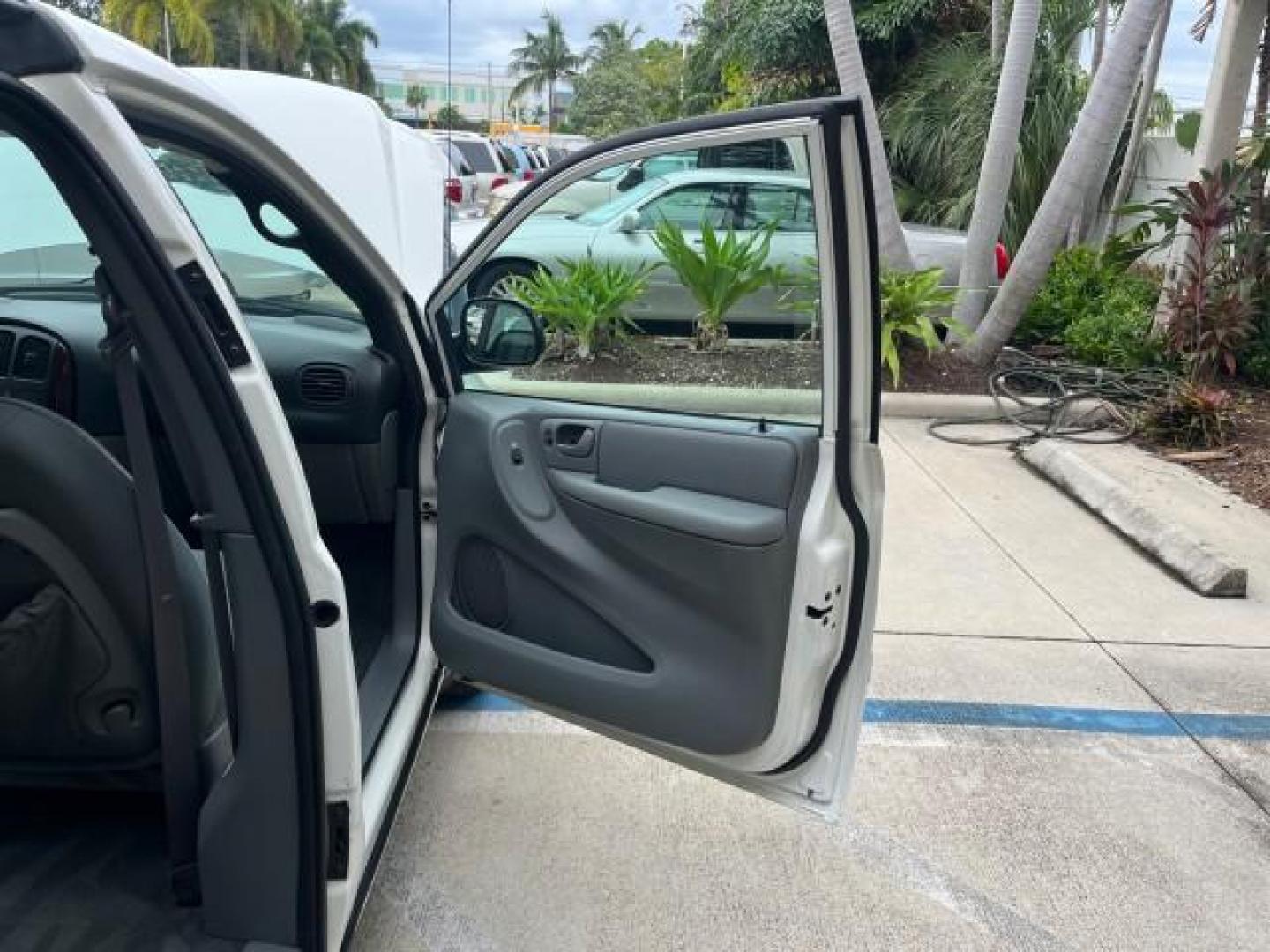 2004 Stone White /Med Slate Gray Chrysler Town and Country 1 FL LX LOW MILES 50,731 (2C4GP44R44R) with an 3.3L OHV V6 Engine engine, Automatic transmission, located at 4701 North Dixie Hwy, Pompano Beach, FL, 33064, (954) 422-2889, 26.240938, -80.123474 - OUR WEBPAGE FLORIDACARS1.COM HAS OVER 100 PHOTOS AND FREE CARFAX LINK 2004 CHRYSLER TOWN AND COUNTRY LX FAMILY VALUE ROAD READY 3.3L V6 VIN: 2C4GP44R44R594288 NO ACCIDENTS 26 MPG VAN NO RECALLS 3 ROW SEATS 3.3L V6 F 12V 11 SERVICE RECORDS GASOLINE 1 OWNER FLORIDA FRONT WHEEL DRIVE LOW MILES 50,731 A - Photo#11