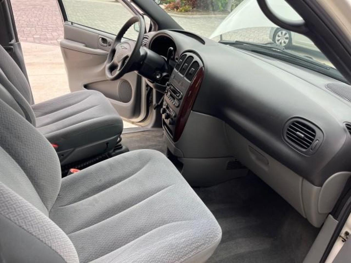 2004 Stone White /Med Slate Gray Chrysler Town and Country 1 FL LX LOW MILES 50,731 (2C4GP44R44R) with an 3.3L OHV V6 Engine engine, Automatic transmission, located at 4701 North Dixie Hwy, Pompano Beach, FL, 33064, (954) 422-2889, 26.240938, -80.123474 - OUR WEBPAGE FLORIDACARS1.COM HAS OVER 100 PHOTOS AND FREE CARFAX LINK 2004 CHRYSLER TOWN AND COUNTRY LX FAMILY VALUE ROAD READY 3.3L V6 VIN: 2C4GP44R44R594288 NO ACCIDENTS 26 MPG VAN NO RECALLS 3 ROW SEATS 3.3L V6 F 12V 11 SERVICE RECORDS GASOLINE 1 OWNER FLORIDA FRONT WHEEL DRIVE LOW MILES 50,731 A - Photo#28