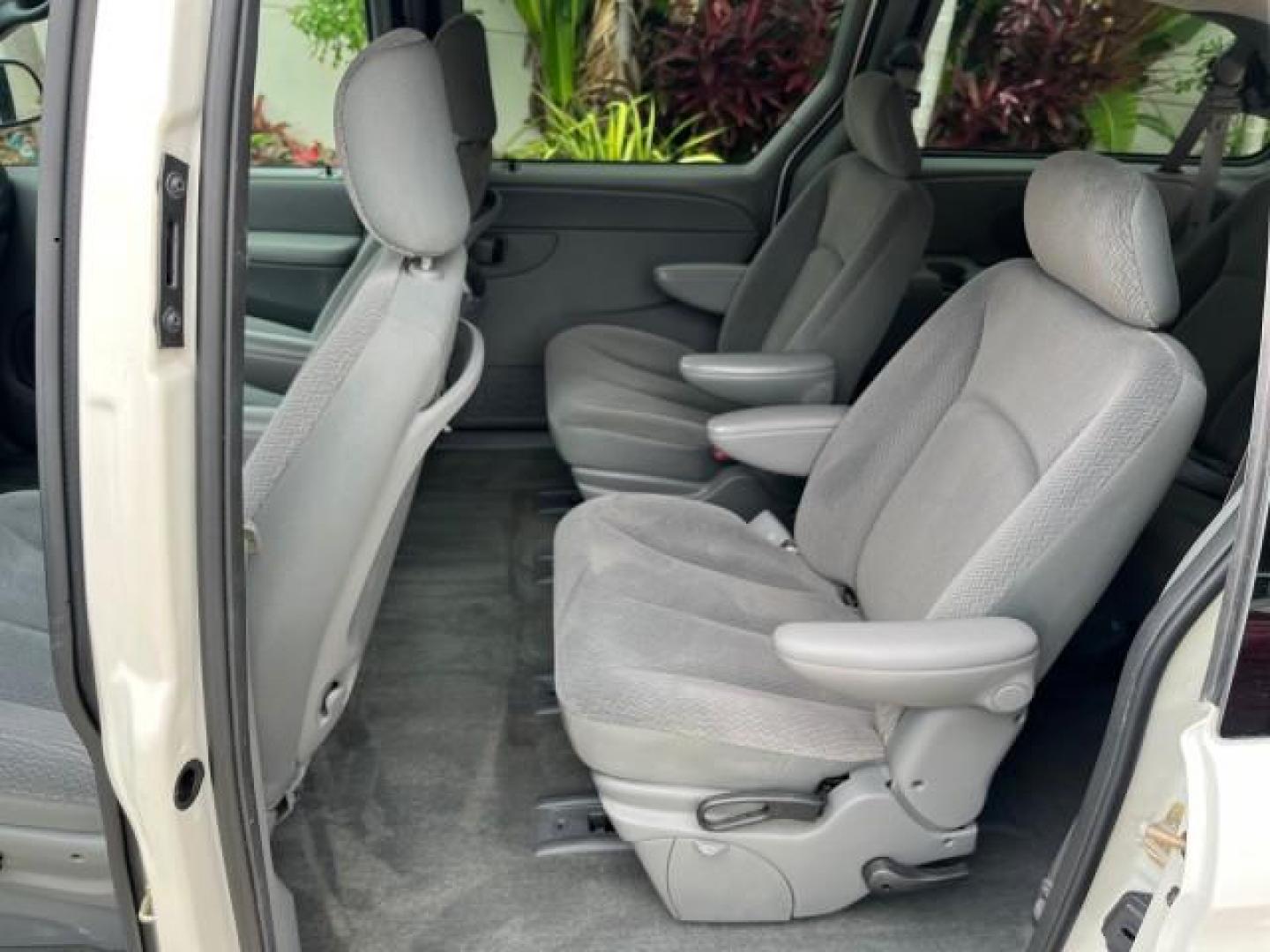 2004 Stone White /Med Slate Gray Chrysler Town and Country 1 FL LX LOW MILES 50,731 (2C4GP44R44R) with an 3.3L OHV V6 Engine engine, Automatic transmission, located at 4701 North Dixie Hwy, Pompano Beach, FL, 33064, (954) 422-2889, 26.240938, -80.123474 - OUR WEBPAGE FLORIDACARS1.COM HAS OVER 100 PHOTOS AND FREE CARFAX LINK 2004 CHRYSLER TOWN AND COUNTRY LX FAMILY VALUE ROAD READY 3.3L V6 VIN: 2C4GP44R44R594288 NO ACCIDENTS 26 MPG VAN NO RECALLS 3 ROW SEATS 3.3L V6 F 12V 11 SERVICE RECORDS GASOLINE 1 OWNER FLORIDA FRONT WHEEL DRIVE LOW MILES 50,731 A - Photo#37