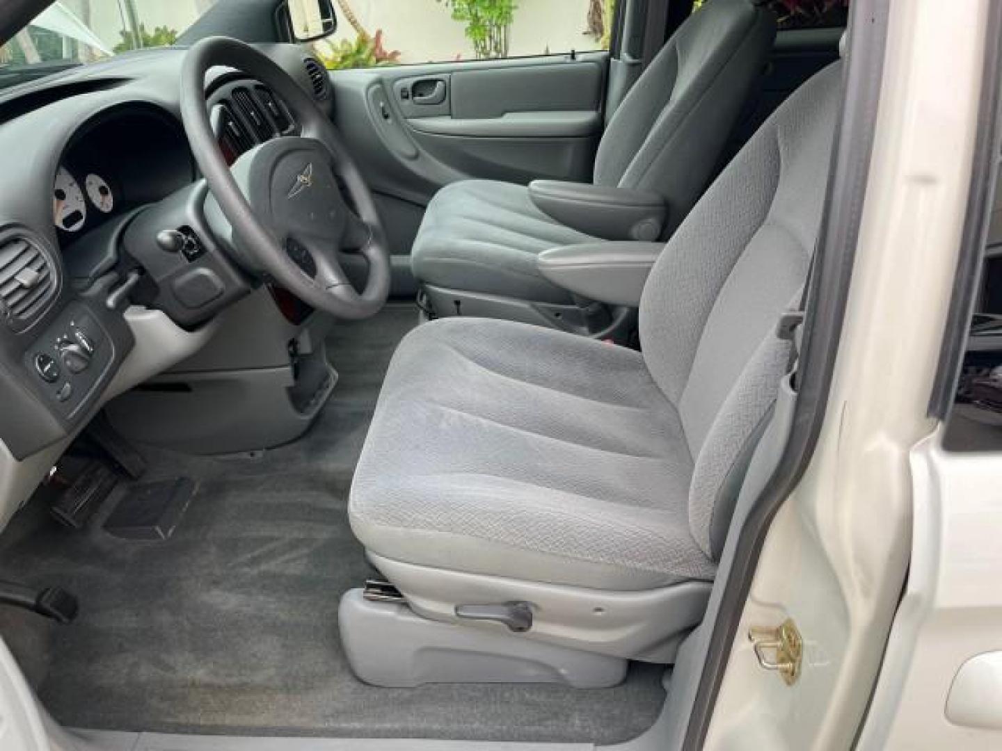 2004 Stone White /Med Slate Gray Chrysler Town and Country 1 FL LX LOW MILES 50,731 (2C4GP44R44R) with an 3.3L OHV V6 Engine engine, Automatic transmission, located at 4701 North Dixie Hwy, Pompano Beach, FL, 33064, (954) 422-2889, 26.240938, -80.123474 - OUR WEBPAGE FLORIDACARS1.COM HAS OVER 100 PHOTOS AND FREE CARFAX LINK 2004 CHRYSLER TOWN AND COUNTRY LX FAMILY VALUE ROAD READY 3.3L V6 VIN: 2C4GP44R44R594288 NO ACCIDENTS 26 MPG VAN NO RECALLS 3 ROW SEATS 3.3L V6 F 12V 11 SERVICE RECORDS GASOLINE 1 OWNER FLORIDA FRONT WHEEL DRIVE LOW MILES 50,731 A - Photo#42