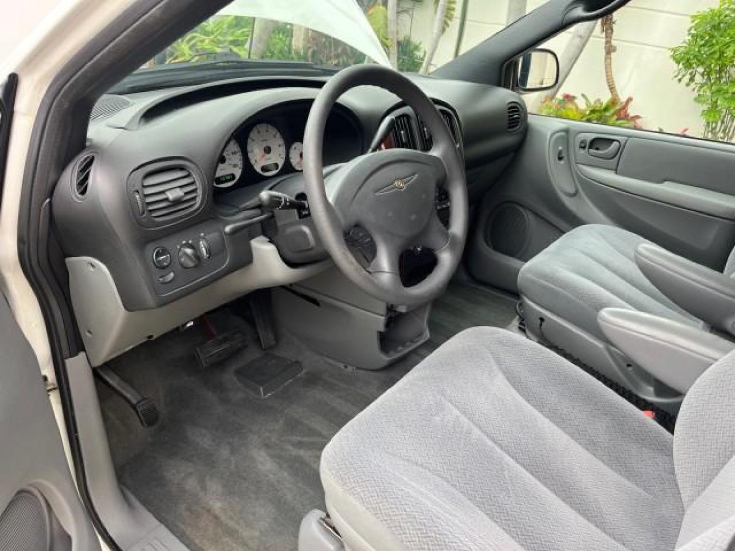 2004 Stone White /Med Slate Gray Chrysler Town and Country 1 FL LX LOW MILES 50,731 (2C4GP44R44R) with an 3.3L OHV V6 Engine engine, Automatic transmission, located at 4701 North Dixie Hwy, Pompano Beach, FL, 33064, (954) 422-2889, 26.240938, -80.123474 - OUR WEBPAGE FLORIDACARS1.COM HAS OVER 100 PHOTOS AND FREE CARFAX LINK 2004 CHRYSLER TOWN AND COUNTRY LX FAMILY VALUE ROAD READY 3.3L V6 VIN: 2C4GP44R44R594288 NO ACCIDENTS 26 MPG VAN NO RECALLS 3 ROW SEATS 3.3L V6 F 12V 11 SERVICE RECORDS GASOLINE 1 OWNER FLORIDA FRONT WHEEL DRIVE LOW MILES 50,731 A - Photo#43