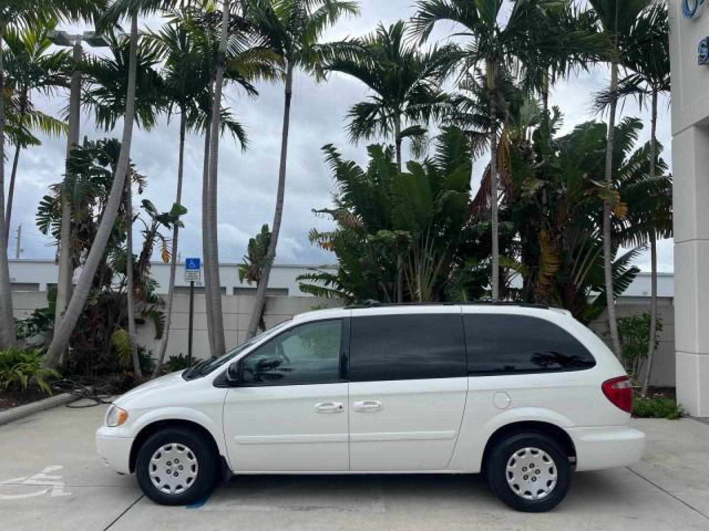 2004 Stone White /Med Slate Gray Chrysler Town and Country 1 FL LX LOW MILES 50,731 (2C4GP44R44R) with an 3.3L OHV V6 Engine engine, Automatic transmission, located at 4701 North Dixie Hwy, Pompano Beach, FL, 33064, (954) 422-2889, 26.240938, -80.123474 - OUR WEBPAGE FLORIDACARS1.COM HAS OVER 100 PHOTOS AND FREE CARFAX LINK 2004 CHRYSLER TOWN AND COUNTRY LX FAMILY VALUE ROAD READY 3.3L V6 VIN: 2C4GP44R44R594288 NO ACCIDENTS 26 MPG VAN NO RECALLS 3 ROW SEATS 3.3L V6 F 12V 11 SERVICE RECORDS GASOLINE 1 OWNER FLORIDA FRONT WHEEL DRIVE LOW MILES 50,731 A - Photo#4