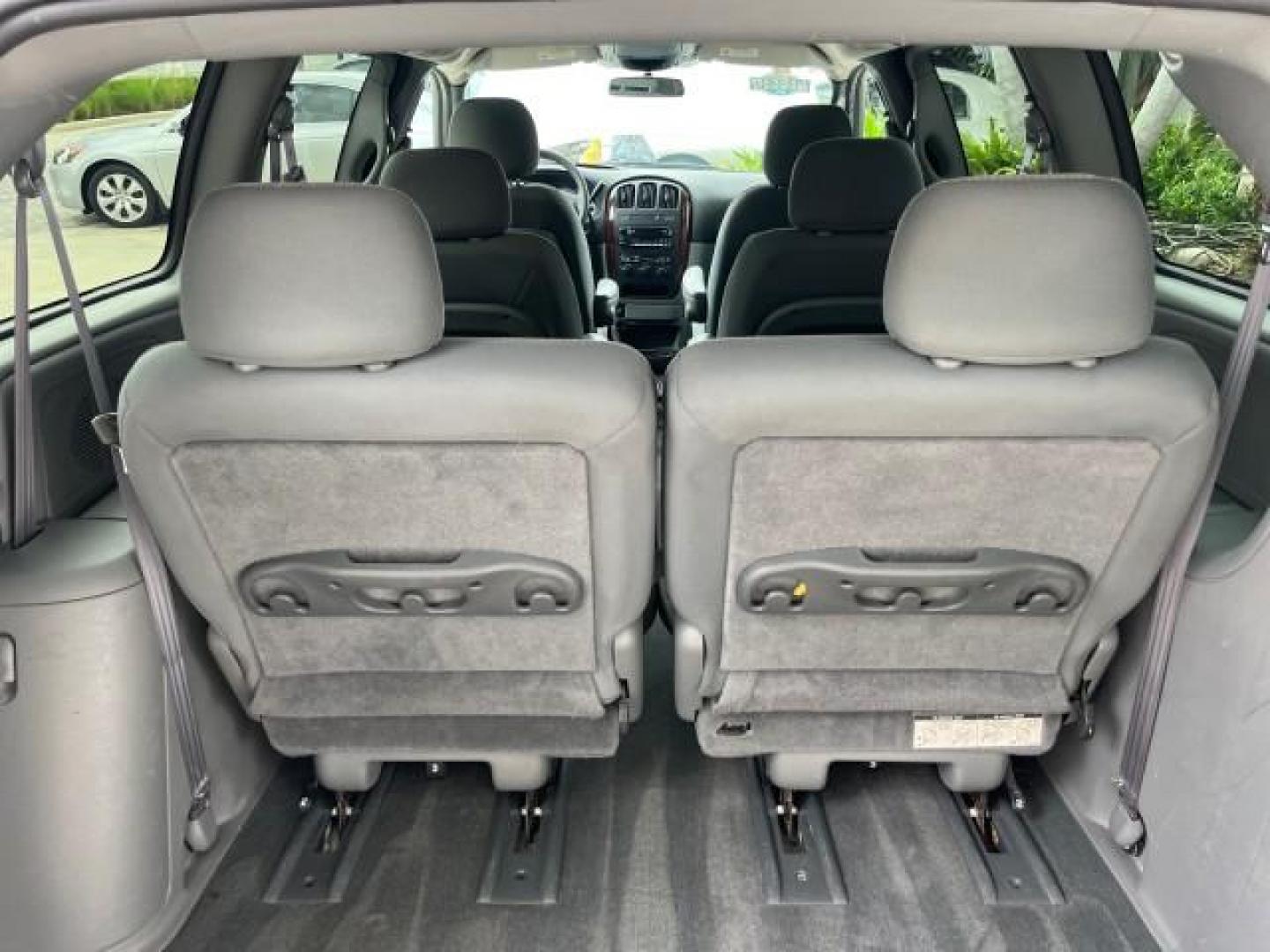 2004 Stone White /Med Slate Gray Chrysler Town and Country 1 FL LX LOW MILES 50,731 (2C4GP44R44R) with an 3.3L OHV V6 Engine engine, Automatic transmission, located at 4701 North Dixie Hwy, Pompano Beach, FL, 33064, (954) 422-2889, 26.240938, -80.123474 - OUR WEBPAGE FLORIDACARS1.COM HAS OVER 100 PHOTOS AND FREE CARFAX LINK 2004 CHRYSLER TOWN AND COUNTRY LX FAMILY VALUE ROAD READY 3.3L V6 VIN: 2C4GP44R44R594288 NO ACCIDENTS 26 MPG VAN NO RECALLS 3 ROW SEATS 3.3L V6 F 12V 11 SERVICE RECORDS GASOLINE 1 OWNER FLORIDA FRONT WHEEL DRIVE LOW MILES 50,731 A - Photo#64