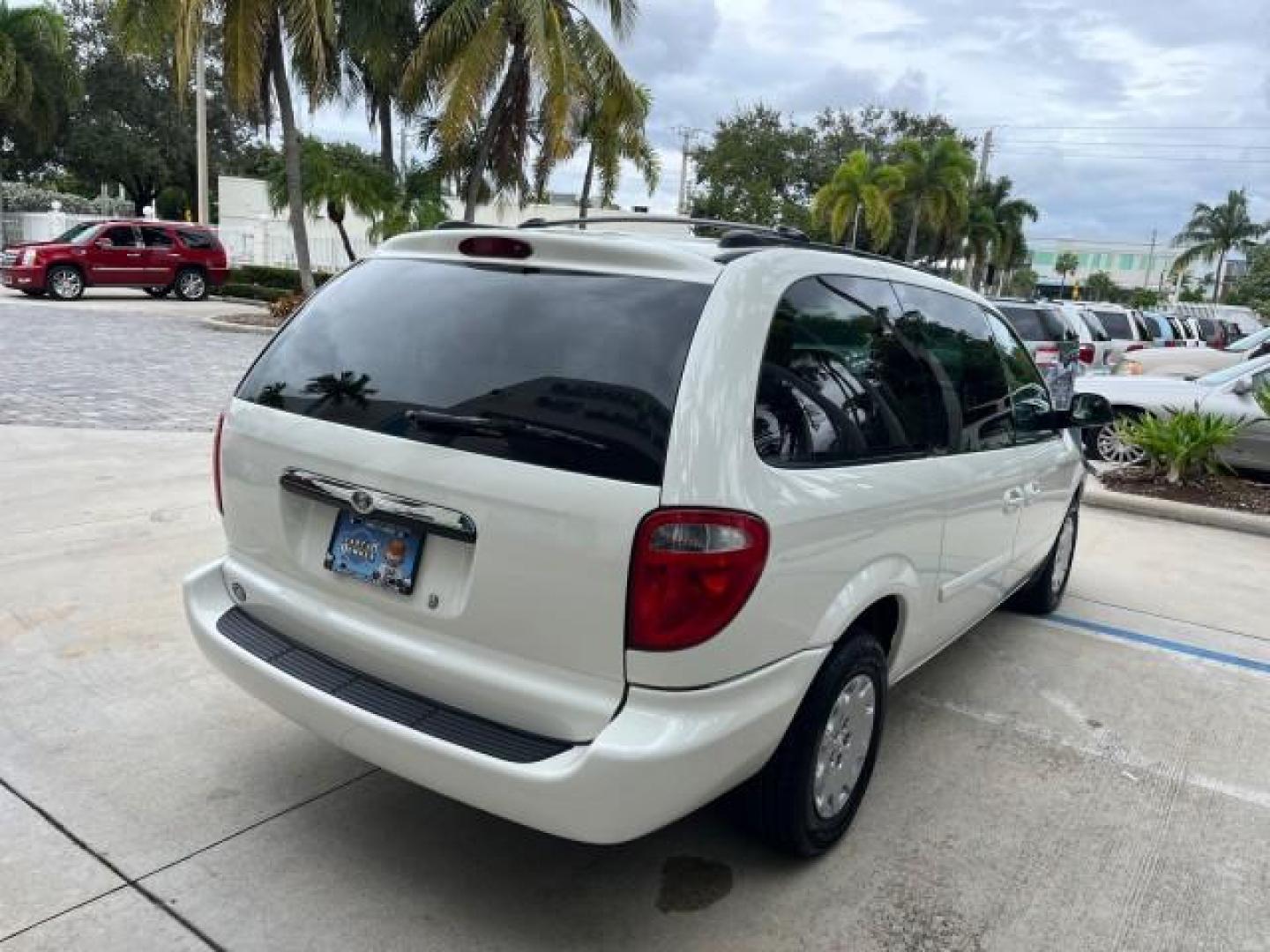 2004 Stone White /Med Slate Gray Chrysler Town and Country 1 FL LX LOW MILES 50,731 (2C4GP44R44R) with an 3.3L OHV V6 Engine engine, Automatic transmission, located at 4701 North Dixie Hwy, Pompano Beach, FL, 33064, (954) 422-2889, 26.240938, -80.123474 - OUR WEBPAGE FLORIDACARS1.COM HAS OVER 100 PHOTOS AND FREE CARFAX LINK 2004 CHRYSLER TOWN AND COUNTRY LX FAMILY VALUE ROAD READY 3.3L V6 VIN: 2C4GP44R44R594288 NO ACCIDENTS 26 MPG VAN NO RECALLS 3 ROW SEATS 3.3L V6 F 12V 11 SERVICE RECORDS GASOLINE 1 OWNER FLORIDA FRONT WHEEL DRIVE LOW MILES 50,731 A - Photo#93