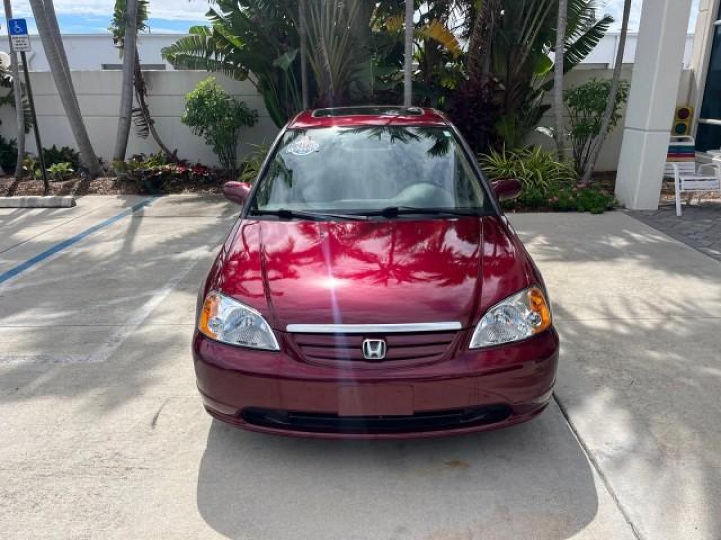 2003 Rallye Red /Ivory Honda Civic 1 FL EX LOW MILES 43,956 (2HGES26783H) with an 1.7L SOHC VTEC 16-Valve I4 ULEV-Certified Engine engine, Automatic transmission, located at 4701 North Dixie Hwy, Pompano Beach, FL, 33064, (954) 422-2889, 26.240938, -80.123474 - OUR WEBPAGE FLORIDACARS1.COM HAS OVER 100 PHOTOS AND FREE CARFAX LINK 2003 HONDA CIVIC EX ROAD READY 1.7L I4 VIN: 2HGES26783H626882 LOW MILES 43,956 SEDAN 4 DR NO ACCIDENTS 1.7L I4 F SOHC NO RECALLS 38 MPG GASOLINE POWER SUNROOF 1 OWNER FLORIDA FRONT WHEEL DRIVE POWER MIRRORS 19 SERVICE RECORDS Appr - Photo#2