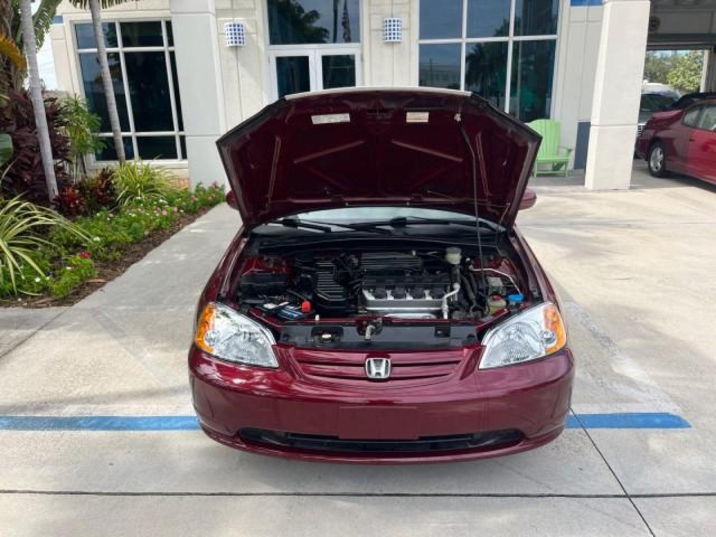 2003 Rallye Red /Ivory Honda Civic 1 FL EX LOW MILES 43,956 (2HGES26783H) with an 1.7L SOHC VTEC 16-Valve I4 ULEV-Certified Engine engine, Automatic transmission, located at 4701 North Dixie Hwy, Pompano Beach, FL, 33064, (954) 422-2889, 26.240938, -80.123474 - OUR WEBPAGE FLORIDACARS1.COM HAS OVER 100 PHOTOS AND FREE CARFAX LINK 2003 HONDA CIVIC EX ROAD READY 1.7L I4 VIN: 2HGES26783H626882 LOW MILES 43,956 SEDAN 4 DR NO ACCIDENTS 1.7L I4 F SOHC NO RECALLS 38 MPG GASOLINE POWER SUNROOF 1 OWNER FLORIDA FRONT WHEEL DRIVE POWER MIRRORS 19 SERVICE RECORDS Appr - Photo#56