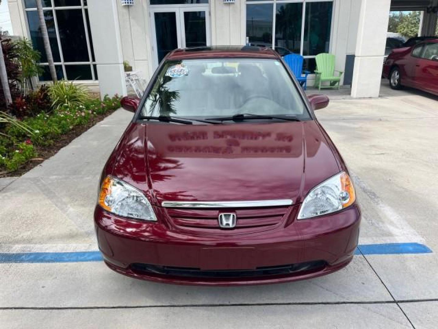 2003 Rallye Red /Ivory Honda Civic 1 FL EX LOW MILES 43,956 (2HGES26783H) with an 1.7L SOHC VTEC 16-Valve I4 ULEV-Certified Engine engine, Automatic transmission, located at 4701 North Dixie Hwy, Pompano Beach, FL, 33064, (954) 422-2889, 26.240938, -80.123474 - OUR WEBPAGE FLORIDACARS1.COM HAS OVER 100 PHOTOS AND FREE CARFAX LINK 2003 HONDA CIVIC EX ROAD READY 1.7L I4 VIN: 2HGES26783H626882 LOW MILES 43,956 SEDAN 4 DR NO ACCIDENTS 1.7L I4 F SOHC NO RECALLS 38 MPG GASOLINE POWER SUNROOF 1 OWNER FLORIDA FRONT WHEEL DRIVE POWER MIRRORS 19 SERVICE RECORDS Appr - Photo#61