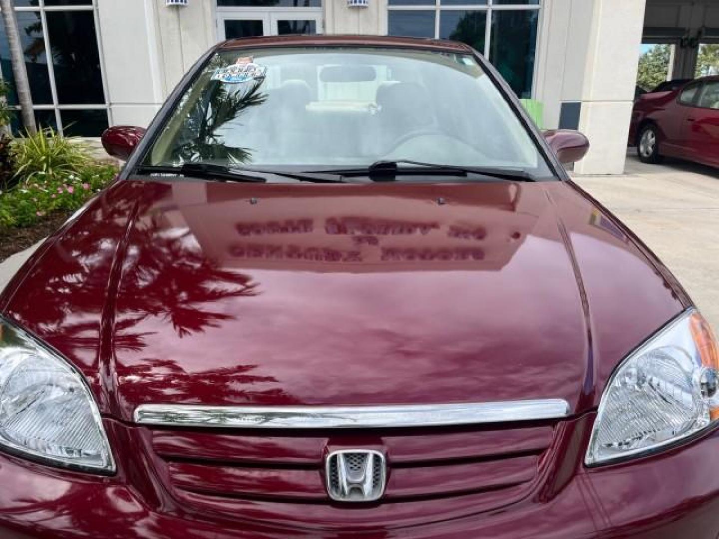 2003 Rallye Red /Ivory Honda Civic 1 FL EX LOW MILES 43,956 (2HGES26783H) with an 1.7L SOHC VTEC 16-Valve I4 ULEV-Certified Engine engine, Automatic transmission, located at 4701 North Dixie Hwy, Pompano Beach, FL, 33064, (954) 422-2889, 26.240938, -80.123474 - OUR WEBPAGE FLORIDACARS1.COM HAS OVER 100 PHOTOS AND FREE CARFAX LINK 2003 HONDA CIVIC EX ROAD READY 1.7L I4 VIN: 2HGES26783H626882 LOW MILES 43,956 SEDAN 4 DR NO ACCIDENTS 1.7L I4 F SOHC NO RECALLS 38 MPG GASOLINE POWER SUNROOF 1 OWNER FLORIDA FRONT WHEEL DRIVE POWER MIRRORS 19 SERVICE RECORDS Appr - Photo#66