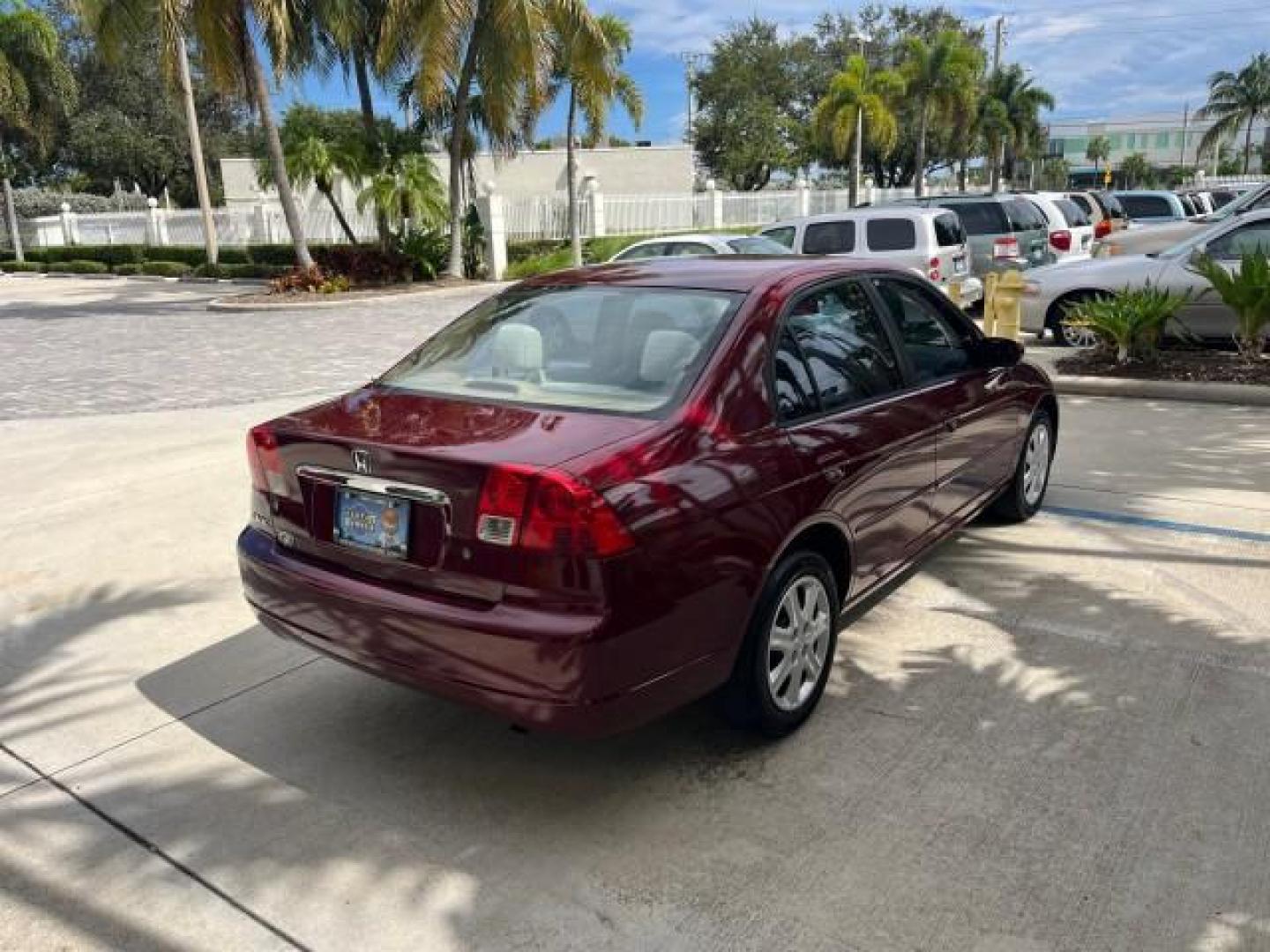 2003 Rallye Red /Ivory Honda Civic 1 FL EX LOW MILES 43,956 (2HGES26783H) with an 1.7L SOHC VTEC 16-Valve I4 ULEV-Certified Engine engine, Automatic transmission, located at 4701 North Dixie Hwy, Pompano Beach, FL, 33064, (954) 422-2889, 26.240938, -80.123474 - OUR WEBPAGE FLORIDACARS1.COM HAS OVER 100 PHOTOS AND FREE CARFAX LINK 2003 HONDA CIVIC EX ROAD READY 1.7L I4 VIN: 2HGES26783H626882 LOW MILES 43,956 SEDAN 4 DR NO ACCIDENTS 1.7L I4 F SOHC NO RECALLS 38 MPG GASOLINE POWER SUNROOF 1 OWNER FLORIDA FRONT WHEEL DRIVE POWER MIRRORS 19 SERVICE RECORDS Appr - Photo#7