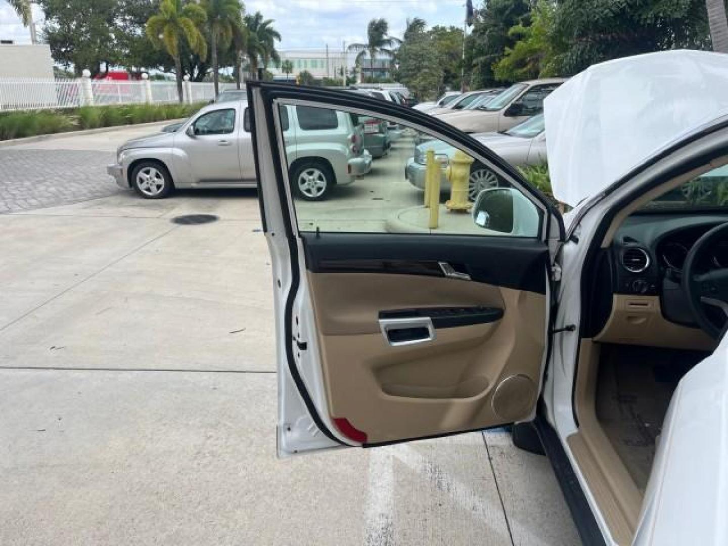 2008 Polar White /Tan Saturn VUE SUNROOF XE LOW MILES 81,856 (3GSCL33PX8S) with an Ecotec 2.4L 4-Cyl MFI Engine engine, Automatic transmission, located at 4701 North Dixie Hwy, Pompano Beach, FL, 33064, (954) 422-2889, 26.240938, -80.123474 - OUR WEBPAGE FLORIDACARS1.COM HAS OVER 100 PHOTOS AND FREE CARFAX LINK 2008 SATURN VUE XE ROAD READY 2.4L I4 VIN: 3GSCL33PX8S711356 NO RECALLS 26 MPG 4 DOOR WAGON/SPORT UTILITY LOW MILES 81,856 2.4L I4 F FLORIDA OWNER GASOLINE 26 SERVICE RECORDS FRONT WHEEL DRIVE HEATED SEATS POWER SUNROOF Anti-Theft - Photo#9