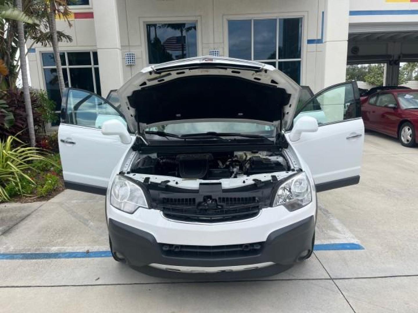 2008 Polar White /Tan Saturn VUE SUNROOF XE LOW MILES 81,856 (3GSCL33PX8S) with an Ecotec 2.4L 4-Cyl MFI Engine engine, Automatic transmission, located at 4701 North Dixie Hwy, Pompano Beach, FL, 33064, (954) 422-2889, 26.240938, -80.123474 - OUR WEBPAGE FLORIDACARS1.COM HAS OVER 100 PHOTOS AND FREE CARFAX LINK 2008 SATURN VUE XE ROAD READY 2.4L I4 VIN: 3GSCL33PX8S711356 NO RECALLS 26 MPG 4 DOOR WAGON/SPORT UTILITY LOW MILES 81,856 2.4L I4 F FLORIDA OWNER GASOLINE 26 SERVICE RECORDS FRONT WHEEL DRIVE HEATED SEATS POWER SUNROOF Anti-Theft - Photo#16