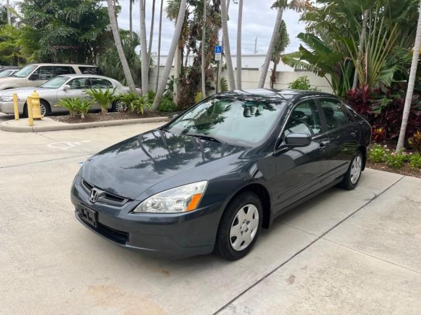 2005 Graphite Pearl /Gray Honda Accord Sdn 1 OWNER LX LOW MILES 34,076 (1HGCM56445A) with an 2.4L DOHC MPFI 16-Valve i-VTEC I4 Engine engine, Automatic transmission, located at 4701 North Dixie Hwy, Pompano Beach, FL, 33064, (954) 422-2889, 26.240938, -80.123474 - OUR WEBPAGE FLORIDACARS1.COM HAS OVER 100 PHOTOS AND FREE CARFAX LINK 2005 HONDA ACCORD LX ROAD READY 2.4L I4 VIN: 1HGCM56445A089339 NO ACCIDENTS 34 MPG SEDAN 4 DR NO RECALLS 2.4L I4 F DOHC 1 OWNER GASOLINE LOW MILES 34,076 FRONT WHEEL DRIVE 9 SERVICE RECORDS Cruise Control Curtain Airbags FWD Front - Photo#3