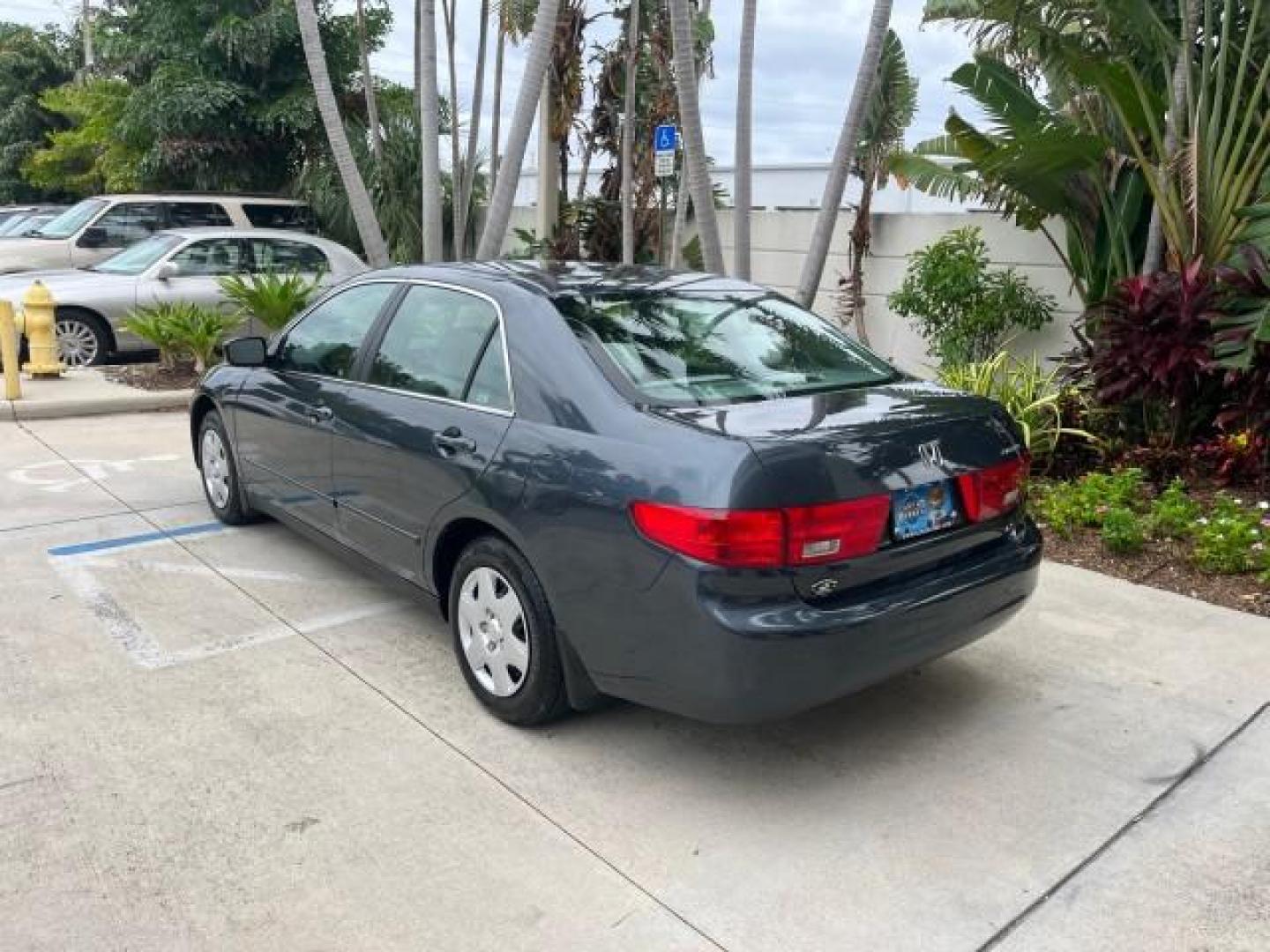 2005 Graphite Pearl /Gray Honda Accord Sdn 1 OWNER LX LOW MILES 34,076 (1HGCM56445A) with an 2.4L DOHC MPFI 16-Valve i-VTEC I4 Engine engine, Automatic transmission, located at 4701 North Dixie Hwy, Pompano Beach, FL, 33064, (954) 422-2889, 26.240938, -80.123474 - OUR WEBPAGE FLORIDACARS1.COM HAS OVER 100 PHOTOS AND FREE CARFAX LINK 2005 HONDA ACCORD LX ROAD READY 2.4L I4 VIN: 1HGCM56445A089339 NO ACCIDENTS 34 MPG SEDAN 4 DR NO RECALLS 2.4L I4 F DOHC 1 OWNER GASOLINE LOW MILES 34,076 FRONT WHEEL DRIVE 9 SERVICE RECORDS Cruise Control Curtain Airbags FWD Front - Photo#5