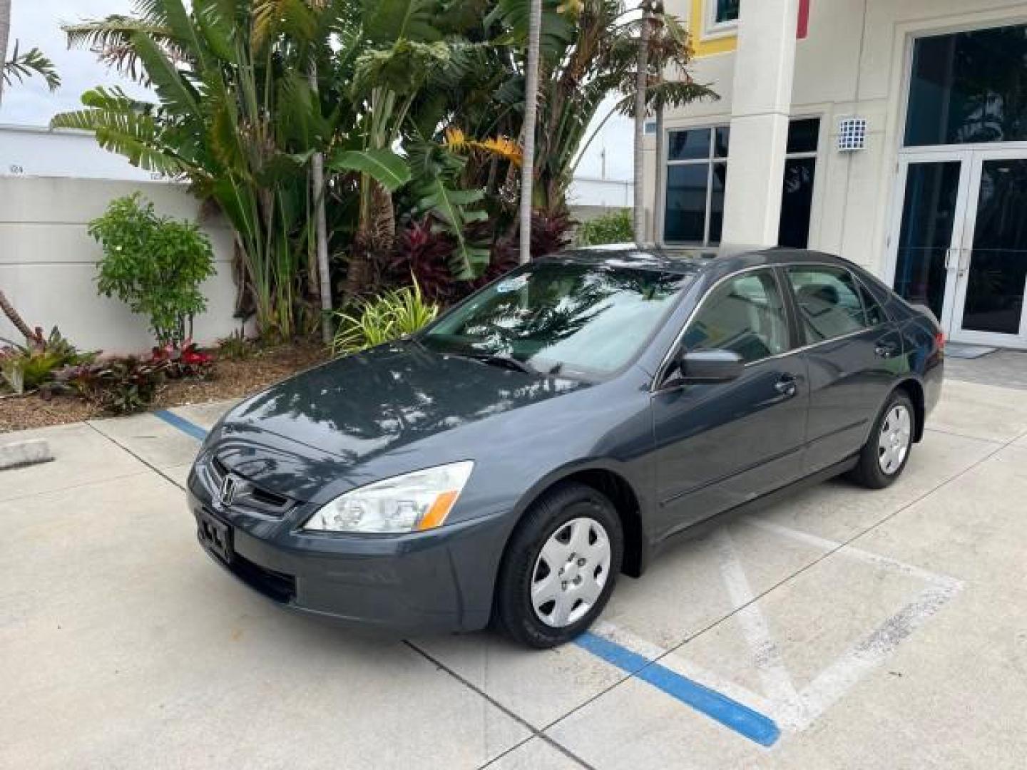 2005 Graphite Pearl /Gray Honda Accord Sdn 1 OWNER LX LOW MILES 34,076 (1HGCM56445A) with an 2.4L DOHC MPFI 16-Valve i-VTEC I4 Engine engine, Automatic transmission, located at 4701 North Dixie Hwy, Pompano Beach, FL, 33064, (954) 422-2889, 26.240938, -80.123474 - OUR WEBPAGE FLORIDACARS1.COM HAS OVER 100 PHOTOS AND FREE CARFAX LINK 2005 HONDA ACCORD LX ROAD READY 2.4L I4 VIN: 1HGCM56445A089339 NO ACCIDENTS 34 MPG SEDAN 4 DR NO RECALLS 2.4L I4 F DOHC 1 OWNER GASOLINE LOW MILES 34,076 FRONT WHEEL DRIVE 9 SERVICE RECORDS Cruise Control Curtain Airbags FWD Front - Photo#85