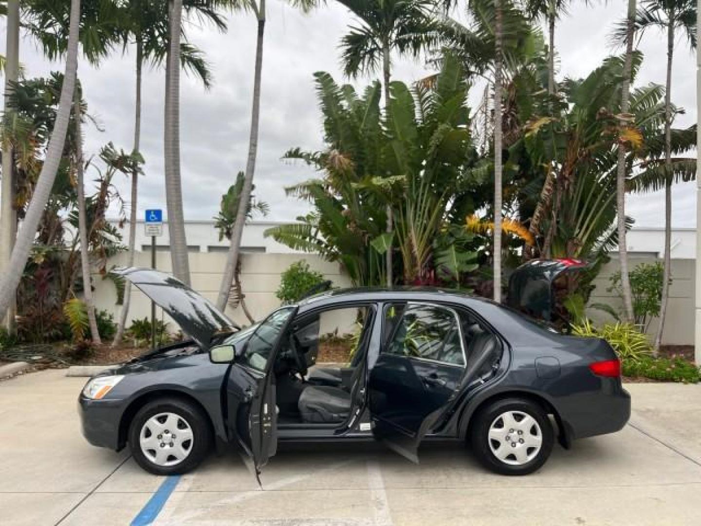 2005 Graphite Pearl /Gray Honda Accord Sdn 1 OWNER LX LOW MILES 34,076 (1HGCM56445A) with an 2.4L DOHC MPFI 16-Valve i-VTEC I4 Engine engine, Automatic transmission, located at 4701 North Dixie Hwy, Pompano Beach, FL, 33064, (954) 422-2889, 26.240938, -80.123474 - OUR WEBPAGE FLORIDACARS1.COM HAS OVER 100 PHOTOS AND FREE CARFAX LINK 2005 HONDA ACCORD LX ROAD READY 2.4L I4 VIN: 1HGCM56445A089339 NO ACCIDENTS 34 MPG SEDAN 4 DR NO RECALLS 2.4L I4 F DOHC 1 OWNER GASOLINE LOW MILES 34,076 FRONT WHEEL DRIVE 9 SERVICE RECORDS Cruise Control Curtain Airbags FWD Front - Photo#8