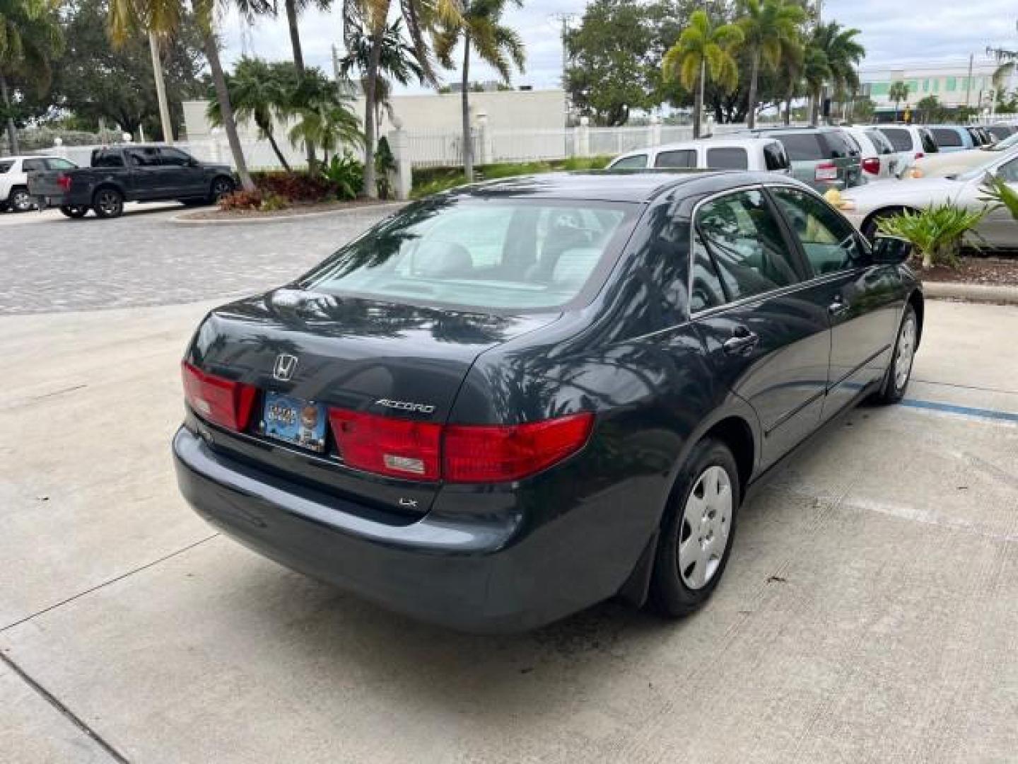 2005 Graphite Pearl /Gray Honda Accord Sdn 1 OWNER LX LOW MILES 34,076 (1HGCM56445A) with an 2.4L DOHC MPFI 16-Valve i-VTEC I4 Engine engine, Automatic transmission, located at 4701 North Dixie Hwy, Pompano Beach, FL, 33064, (954) 422-2889, 26.240938, -80.123474 - OUR WEBPAGE FLORIDACARS1.COM HAS OVER 100 PHOTOS AND FREE CARFAX LINK 2005 HONDA ACCORD LX ROAD READY 2.4L I4 VIN: 1HGCM56445A089339 NO ACCIDENTS 34 MPG SEDAN 4 DR NO RECALLS 2.4L I4 F DOHC 1 OWNER GASOLINE LOW MILES 34,076 FRONT WHEEL DRIVE 9 SERVICE RECORDS Cruise Control Curtain Airbags FWD Front - Photo#92