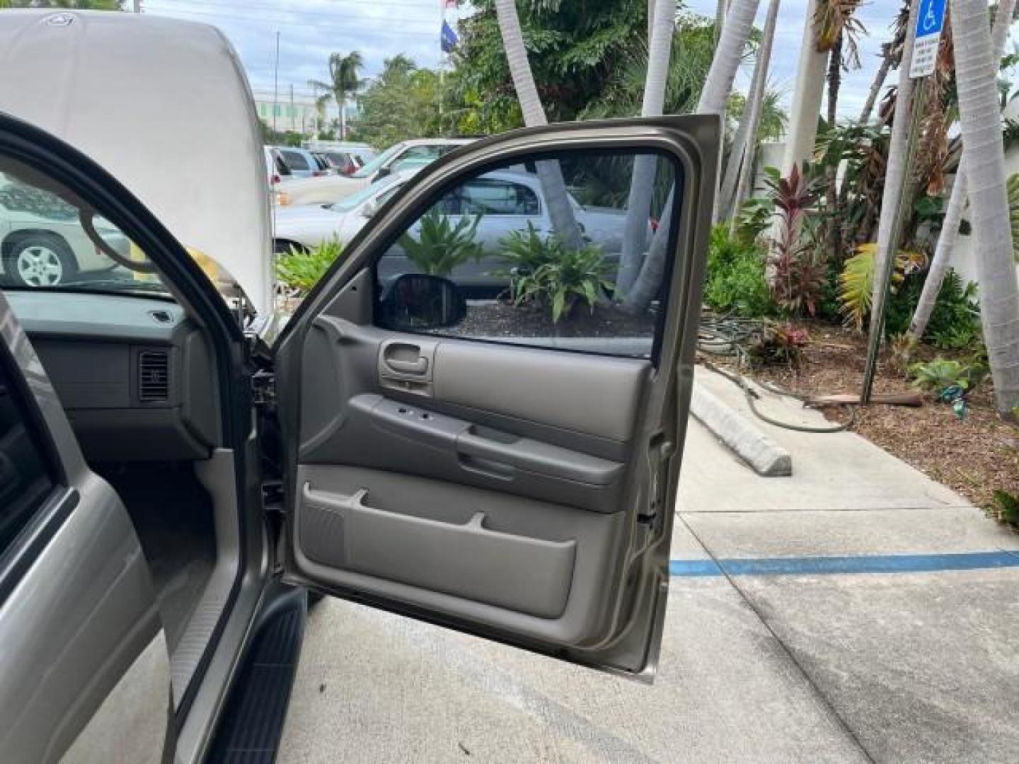 2003 Light Almond Pearl Metallic /Sandstone Dodge Durango 1 FL Sport LOW MILES 61,144 (1D4HR38N53F) with an 4.7L SOHC SMPI V8 Magnum Engine engine, Automatic transmission, located at 4701 North Dixie Hwy, Pompano Beach, FL, 33064, (954) 422-2889, 26.240938, -80.123474 - OUR WEBPAGE FLORIDACARS1.COM HAS OVER 100 PHOTOS AND FREE CARFAX LINK 2003 DODGE DURANGO SPORT ROAD READY 4.7L V8 VIN: 1D4HR38N53F615237 NO ACCIDENTS 4 DOOR WAGON/SPORT UTILITY NO RECALLS 4.7L V8 F OHV 1 OWNER FLORIDA GASOLINE DUAL AC LOW MILES 61,144 REAR WHEEL DRIVE 15 SERVICE RECORDS 3 ROW LEATHE - Photo#11