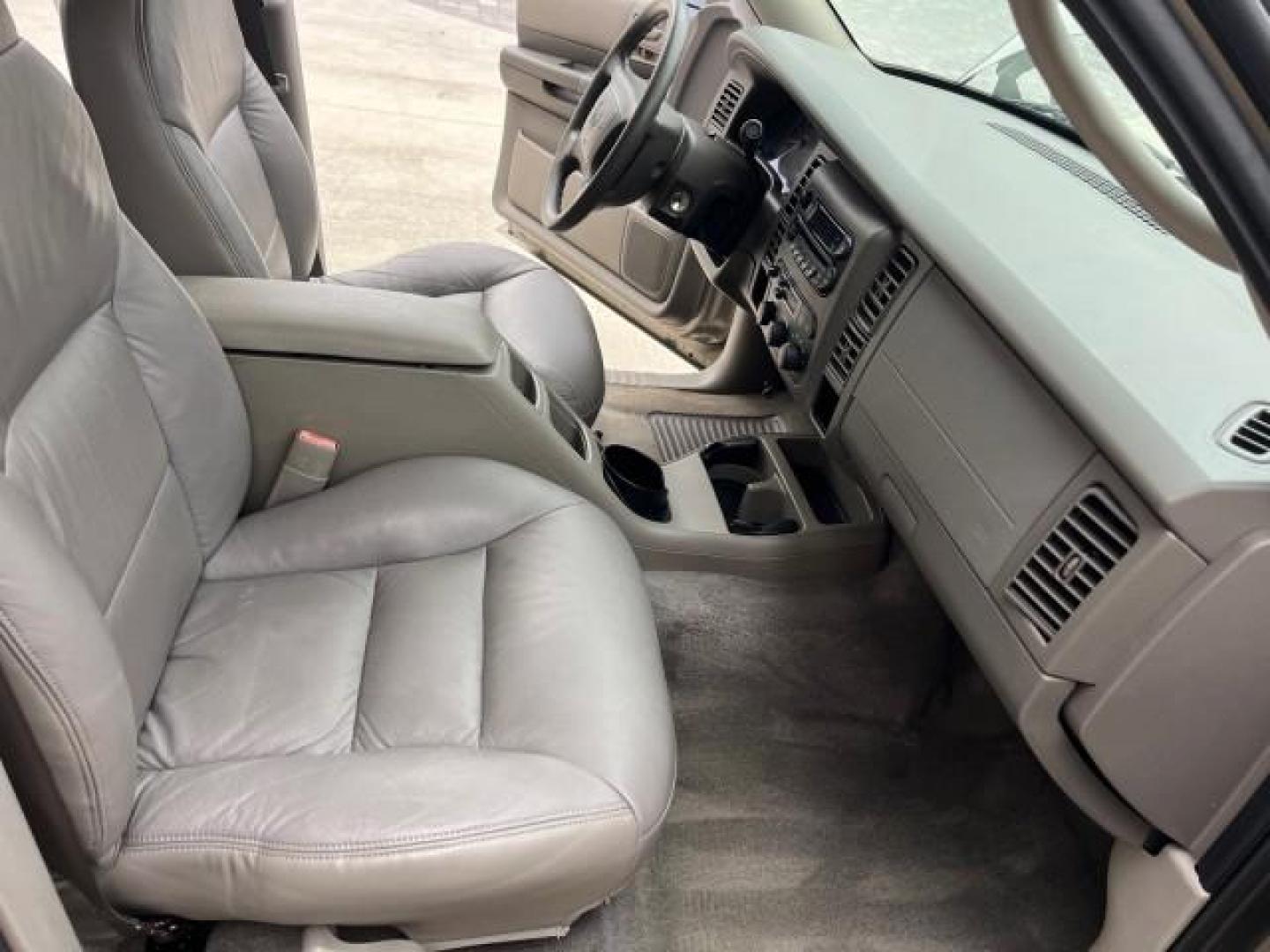 2003 Light Almond Pearl Metallic /Sandstone Dodge Durango 1 FL Sport LOW MILES 61,144 (1D4HR38N53F) with an 4.7L SOHC SMPI V8 Magnum Engine engine, Automatic transmission, located at 4701 North Dixie Hwy, Pompano Beach, FL, 33064, (954) 422-2889, 26.240938, -80.123474 - OUR WEBPAGE FLORIDACARS1.COM HAS OVER 100 PHOTOS AND FREE CARFAX LINK 2003 DODGE DURANGO SPORT ROAD READY 4.7L V8 VIN: 1D4HR38N53F615237 NO ACCIDENTS 4 DOOR WAGON/SPORT UTILITY NO RECALLS 4.7L V8 F OHV 1 OWNER FLORIDA GASOLINE DUAL AC LOW MILES 61,144 REAR WHEEL DRIVE 15 SERVICE RECORDS 3 ROW LEATHE - Photo#29