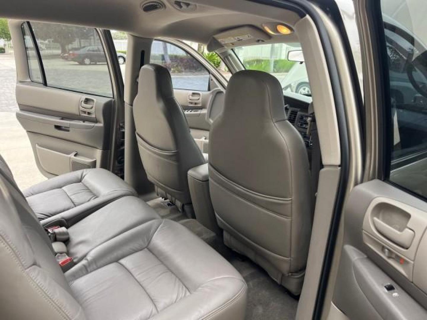 2003 Light Almond Pearl Metallic /Sandstone Dodge Durango 1 FL Sport LOW MILES 61,144 (1D4HR38N53F) with an 4.7L SOHC SMPI V8 Magnum Engine engine, Automatic transmission, located at 4701 North Dixie Hwy, Pompano Beach, FL, 33064, (954) 422-2889, 26.240938, -80.123474 - OUR WEBPAGE FLORIDACARS1.COM HAS OVER 100 PHOTOS AND FREE CARFAX LINK 2003 DODGE DURANGO SPORT ROAD READY 4.7L V8 VIN: 1D4HR38N53F615237 NO ACCIDENTS 4 DOOR WAGON/SPORT UTILITY NO RECALLS 4.7L V8 F OHV 1 OWNER FLORIDA GASOLINE DUAL AC LOW MILES 61,144 REAR WHEEL DRIVE 15 SERVICE RECORDS 3 ROW LEATHE - Photo#32