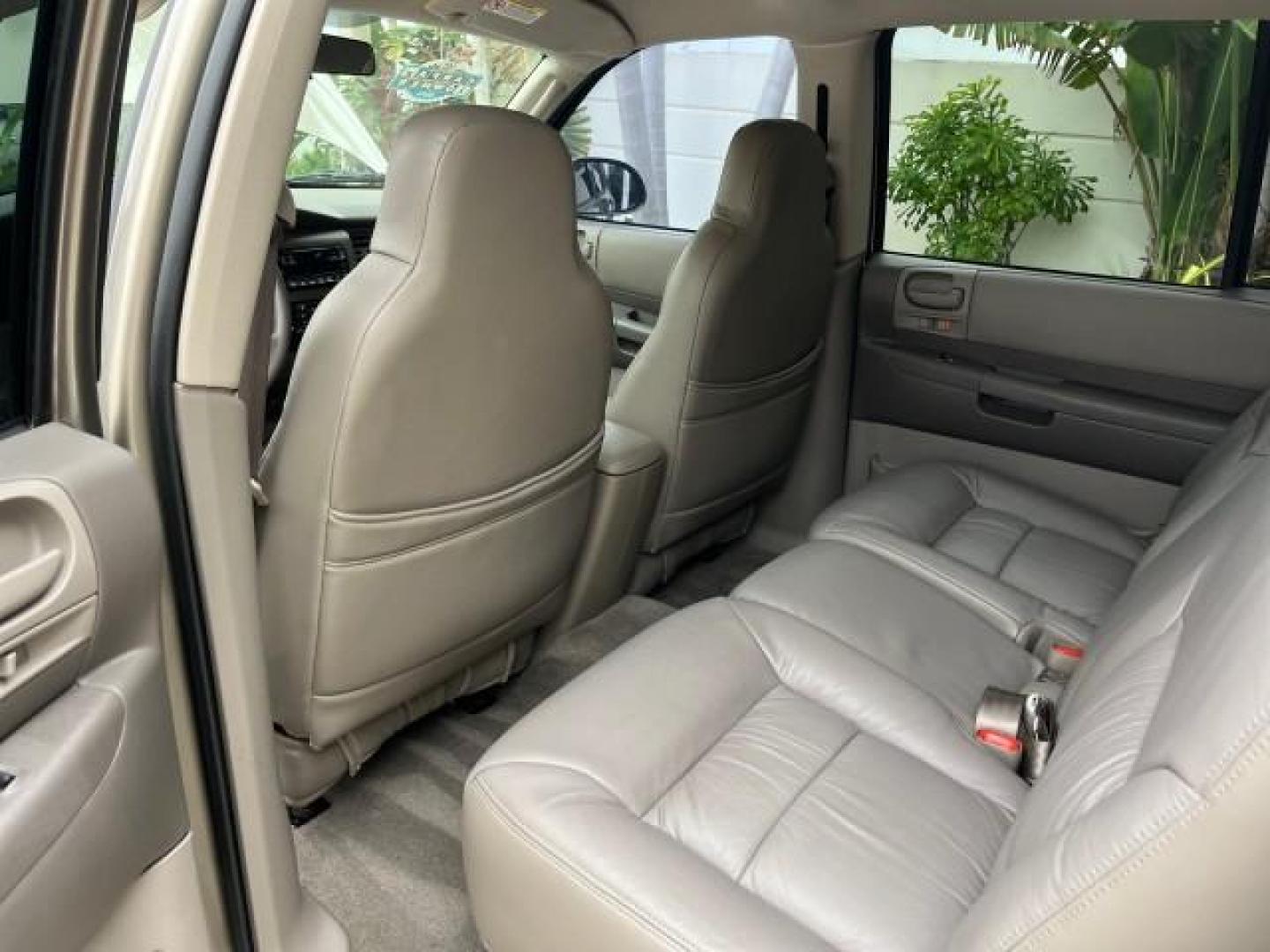 2003 Light Almond Pearl Metallic /Sandstone Dodge Durango 1 FL Sport LOW MILES 61,144 (1D4HR38N53F) with an 4.7L SOHC SMPI V8 Magnum Engine engine, Automatic transmission, located at 4701 North Dixie Hwy, Pompano Beach, FL, 33064, (954) 422-2889, 26.240938, -80.123474 - OUR WEBPAGE FLORIDACARS1.COM HAS OVER 100 PHOTOS AND FREE CARFAX LINK 2003 DODGE DURANGO SPORT ROAD READY 4.7L V8 VIN: 1D4HR38N53F615237 NO ACCIDENTS 4 DOOR WAGON/SPORT UTILITY NO RECALLS 4.7L V8 F OHV 1 OWNER FLORIDA GASOLINE DUAL AC LOW MILES 61,144 REAR WHEEL DRIVE 15 SERVICE RECORDS 3 ROW LEATHE - Photo#42