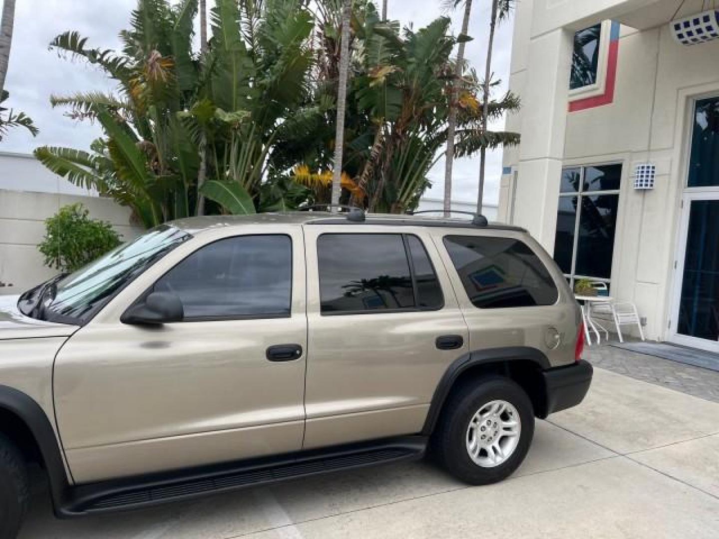 2003 Light Almond Pearl Metallic /Sandstone Dodge Durango 1 FL Sport LOW MILES 61,144 (1D4HR38N53F) with an 4.7L SOHC SMPI V8 Magnum Engine engine, Automatic transmission, located at 4701 North Dixie Hwy, Pompano Beach, FL, 33064, (954) 422-2889, 26.240938, -80.123474 - OUR WEBPAGE FLORIDACARS1.COM HAS OVER 100 PHOTOS AND FREE CARFAX LINK 2003 DODGE DURANGO SPORT ROAD READY 4.7L V8 VIN: 1D4HR38N53F615237 NO ACCIDENTS 4 DOOR WAGON/SPORT UTILITY NO RECALLS 4.7L V8 F OHV 1 OWNER FLORIDA GASOLINE DUAL AC LOW MILES 61,144 REAR WHEEL DRIVE 15 SERVICE RECORDS 3 ROW LEATHE - Photo#88