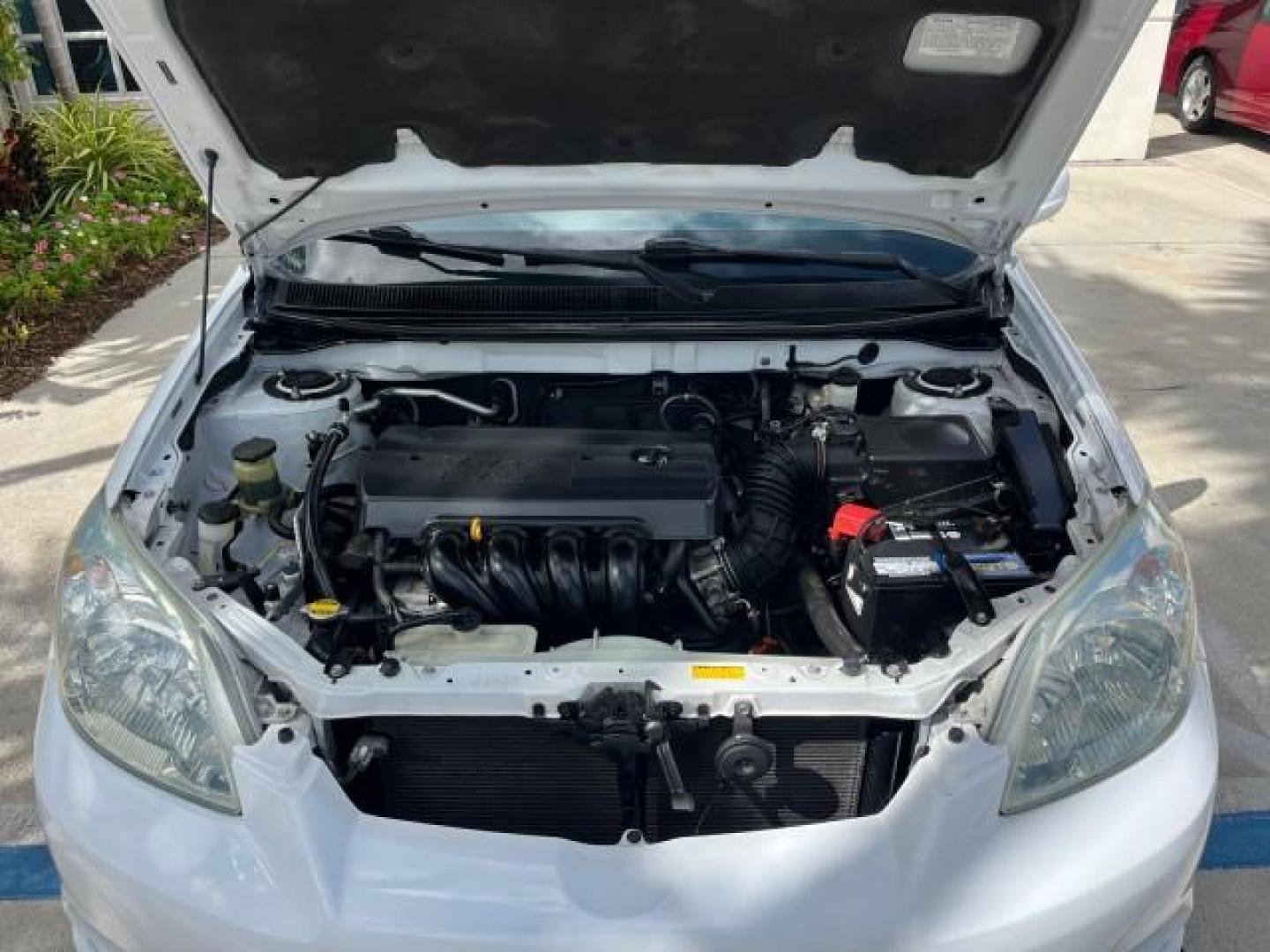 2006 Super White /Dark Gray Toyota Matrix 1 OWNER XR LOW MILES 47,836 (2T1KR32E96C) with an 1.8L DOHC 16-Valve 4-Cyl Engine engine, Automatic transmission, located at 4701 North Dixie Hwy, Pompano Beach, FL, 33064, (954) 422-2889, 26.240938, -80.123474 - OUR WEBPAGE FLORIDACARS1.COM HAS OVER 100 PHOTOS AND FREE CARFAX LINK 2006 TOYOTA MATRIX ROAD READY 1.8L I4 VIN: 2T1KR32E96C600281 NO ACCIDENTS 34 MPG HATCHBACK 4 DR 1 OWNER 1.8L I4 F DOHC 16V LOW MILES 47,836 GASOLINE 11 SERVICE RECORDS FRONT WHEEL DRIVE POWER MIRRORS Anti-Theft System FWD Front Bu - Photo#73