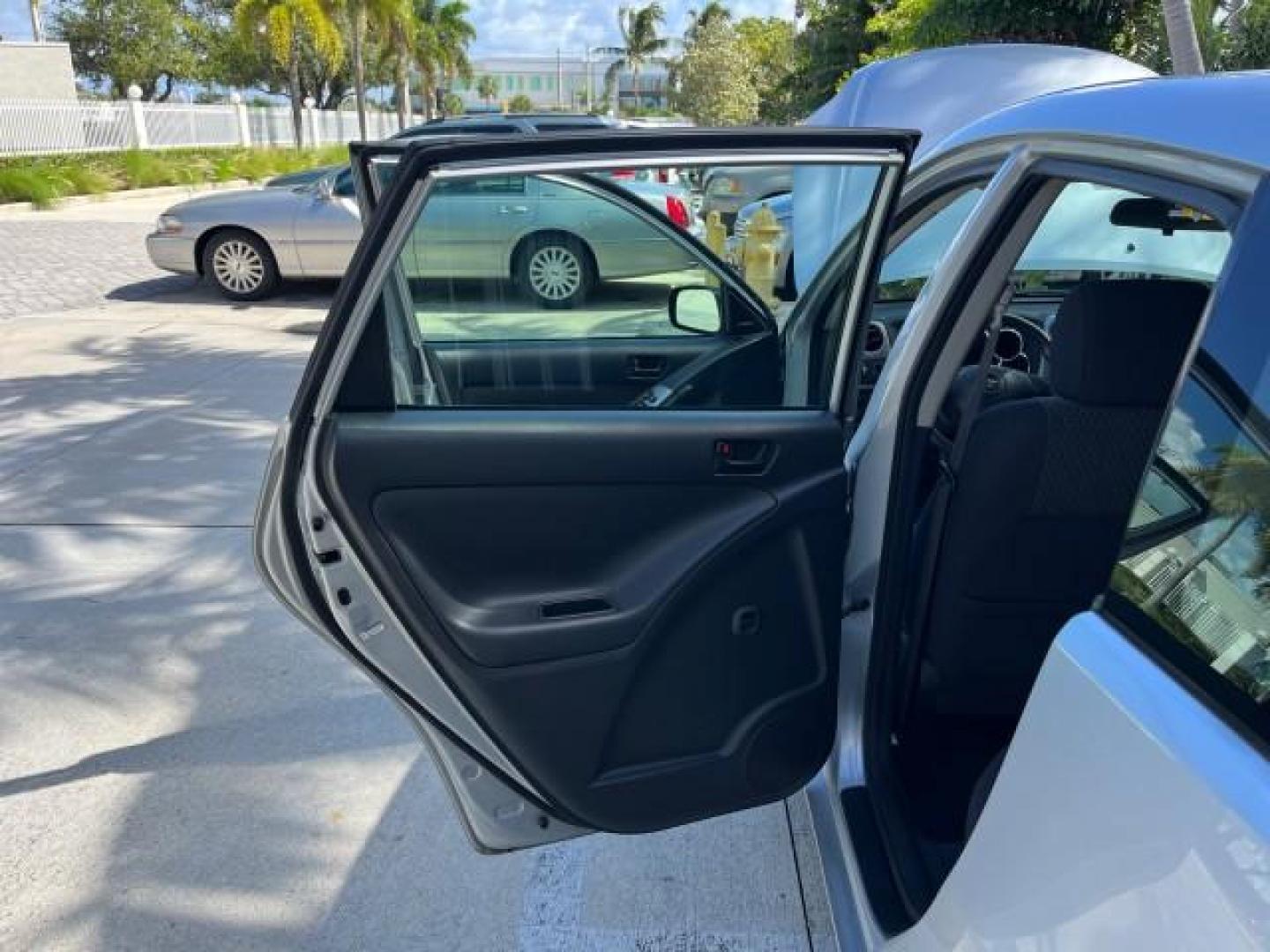 2006 Silver Streak Mica /Dark Gray Toyota Matrix AUTO AC LOW MILES 60,330 (2T1KR32E96C) with an 1.8L DOHC 16-Valve 4-Cyl Engine engine, Automatic transmission, located at 4701 North Dixie Hwy, Pompano Beach, FL, 33064, (954) 422-2889, 26.240938, -80.123474 - OUR WEBPAGE FLORIDACARS1.COM HAS OVER 100 PHOTOS AND FREE CARFAX LINK 2006 TOYOTA MATRIX ROAD READY 1.8L I4 VIN: 2T1KR32E96C593087 NO ACCIDENTS HATCHBACK 4 DR 19 SERVICE RECORDS 1.8L I4 F DOHC 16V 34 MPG GASOLINE POWER MIRRORS FRONT WHEEL DRIVE Anti-Theft System FWD Front Bucket Seats [AB] ANTI-LOCK - Photo#13