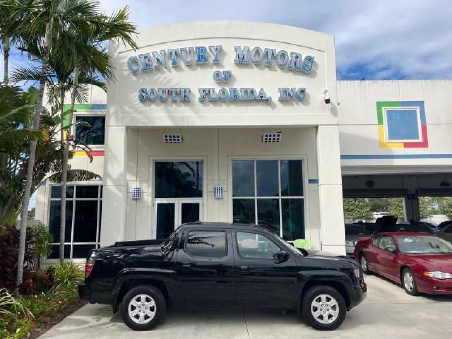 2006 Nighthawk Black Pearl /Gray Honda Ridgeline RTL SUNROOF LOW MILES 82,704 (2HJYK16546H) with an 3.5L SOHC PGM-FI 24-Valve VTEC V6 Engine engine, Automatic transmission, located at 4701 North Dixie Hwy, Pompano Beach, FL, 33064, (954) 422-2889, 26.240938, -80.123474 - OUR WEBPAGE FLORIDACARS1.COM HAS OVER 100 PHOTOS AND FREE CARFAX LINK 2006 HONDA RIDGELINE RTL ROAD READY 3.5L V6 VIN: 2HJYK16546H553594 NO ACCIDENTS CREW PICKUP NO RECALLS AWD 3.5L V6 F SOHC LOW MILES 82,704 GASOLINE POWER SUNROOF ALL WHEEL DRIVE 5 FT BED LENGHT POWER LEATHER SEATS 5.0' Bed Length - Photo#0