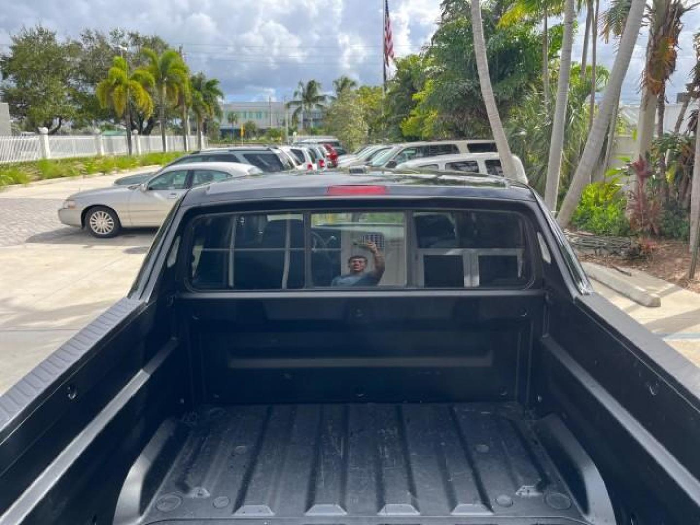 2006 Nighthawk Black Pearl /Gray Honda Ridgeline RTL SUNROOF LOW MILES 82,704 (2HJYK16546H) with an 3.5L SOHC PGM-FI 24-Valve VTEC V6 Engine engine, Automatic transmission, located at 4701 North Dixie Hwy, Pompano Beach, FL, 33064, (954) 422-2889, 26.240938, -80.123474 - OUR WEBPAGE FLORIDACARS1.COM HAS OVER 100 PHOTOS AND FREE CARFAX LINK 2006 HONDA RIDGELINE RTL ROAD READY 3.5L V6 VIN: 2HJYK16546H553594 NO ACCIDENTS CREW PICKUP NO RECALLS AWD 3.5L V6 F SOHC LOW MILES 82,704 GASOLINE POWER SUNROOF ALL WHEEL DRIVE 5 FT BED LENGHT POWER LEATHER SEATS 5.0' Bed Length - Photo#96