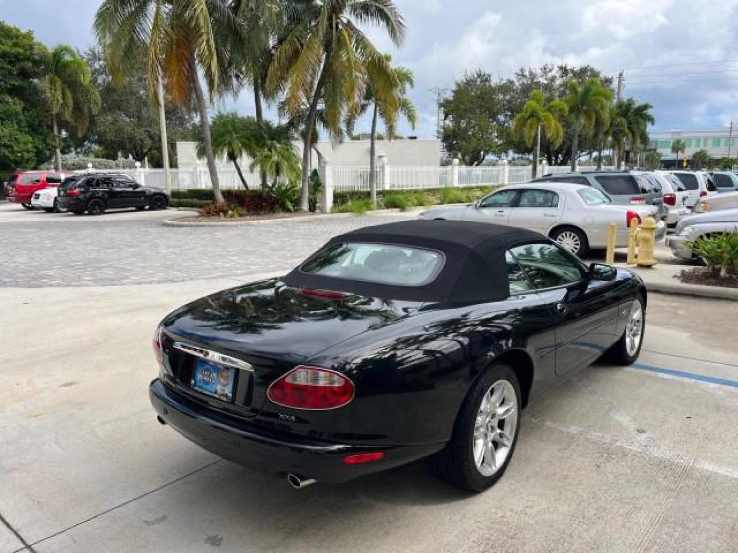 2001 Anthracite /Cashmere Jaguar XK8 1 OWNER LOW MILES 22,992 (SAJDA42C91N) with an 4.0L DOHC SPFI 32-Valve Aluminum Alloy V8 Engine engine, Automatic transmission, located at 4701 North Dixie Hwy, Pompano Beach, FL, 33064, (954) 422-2889, 26.240938, -80.123474 - OUR WEBPAGE FLORIDACARS1.COM HAS OVER 100 PHOTOS AND FREE CARFAX LINK 2001 JAGUAR XK-SERIES XK8 $75,855 NEW ROAD READY 4.0L V8 VIN: SAJDA42C91NA20320 NO ACCIDENTS 24 MPG CONVERTIBLE NO RECALLS 4.0L V8 F DOHC 32V POWER LEATHER SEATS GASOLINE 1 OWNER POWER CONVERTIBLE TOP REAR WHEEL DRIVE SUPER LOW MI - Photo#7