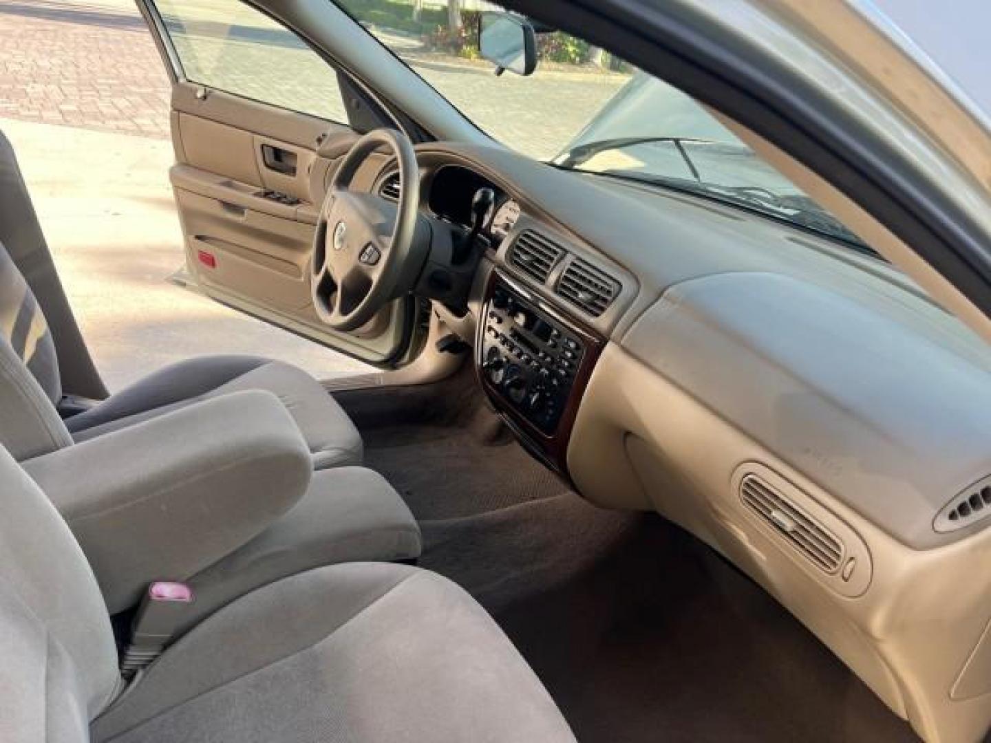 2003 Arizona Beige Metallic /Medium Graphite Mercury Sable 22 SERV GS LOW MILES 36,491 (1MEFM50U23A) with an 3.0L OHV SMPI 12-Valve V6 Vulcan Engine engine, Automatic transmission, located at 4701 North Dixie Hwy, Pompano Beach, FL, 33064, (954) 422-2889, 26.240938, -80.123474 - OUR WEBPAGE FLORIDACARS1.COM HAS OVER 100 PHOTOS AND FREE CARFAX LINK 2003 MERCURY SABLE GS ROAD READY 3.0L V6 VIN: 1MEFM50U23A622840 NO ACCIDENTS SEDAN 4 DR NO RECALLS 28 MPG 3.0L V6 F POWER MIRRORS GASOLINE LOW MILES 36,491 FRONT WHEEL DRIVE 22 SERVICE RECORDS Anti-Theft System Cruise Control FWD - Photo#29