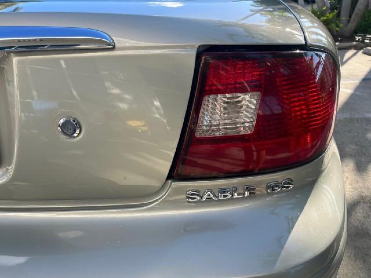 2003 Arizona Beige Metallic /Medium Graphite Mercury Sable 22 SERV GS LOW MILES 36,491 (1MEFM50U23A) with an 3.0L OHV SMPI 12-Valve V6 Vulcan Engine engine, Automatic transmission, located at 4701 North Dixie Hwy, Pompano Beach, FL, 33064, (954) 422-2889, 26.240938, -80.123474 - OUR WEBPAGE FLORIDACARS1.COM HAS OVER 100 PHOTOS AND FREE CARFAX LINK 2003 MERCURY SABLE GS ROAD READY 3.0L V6 VIN: 1MEFM50U23A622840 NO ACCIDENTS SEDAN 4 DR NO RECALLS 28 MPG 3.0L V6 F POWER MIRRORS GASOLINE LOW MILES 36,491 FRONT WHEEL DRIVE 22 SERVICE RECORDS Anti-Theft System Cruise Control FWD - Photo#89