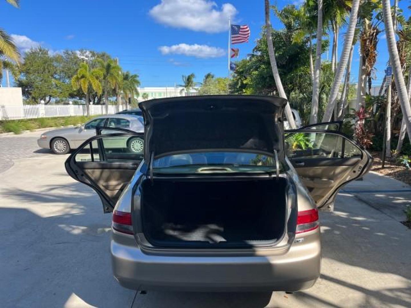 2003 Desert Mist Metallic /Ivory Honda Accord Sdn 26 SERV EX LOW MILES 79,568 (1HGCM66583A) with an 3.0L SOHC 24-Valve VTEC V6 LEV-Certified Engine engine, Automatic transmission, located at 4701 North Dixie Hwy, Pompano Beach, FL, 33064, (954) 422-2889, 26.240938, -80.123474 - OUR WEBPAGE FLORIDACARS1.COM HAS OVER 100 PHOTOS AND FREE CARFAX LINK 2003 HONDA ACCORD EX V-6 ROAD READY 3.0L V6 VIN: 1HGCM66583A061328 NO RECALLS 30 MPG SEDAN 4 DR FLORIDA OWNER 3.0L V6 F SOHC 24V LOW MILES 79,568 GASOLINE POWER LEATHER SEATS FRONT WHEEL DRIVE 26 SERVICE RECORDS POWER SUNROOF Allo - Photo#15