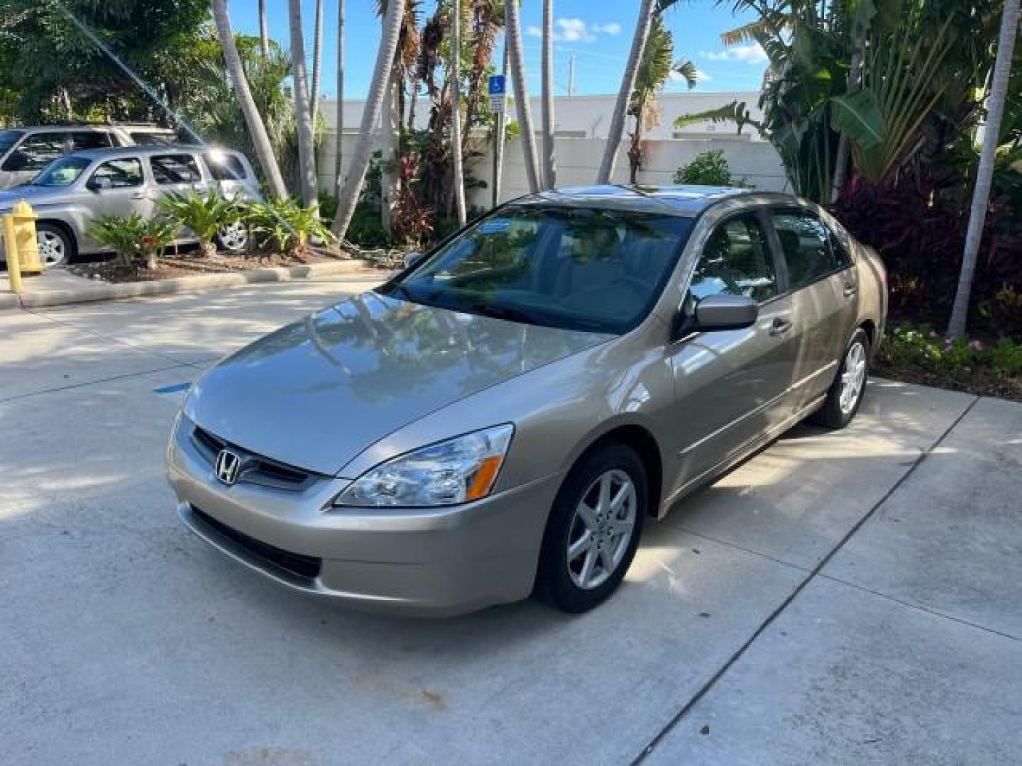 2003 Desert Mist Metallic /Ivory Honda Accord Sdn 26 SERV EX LOW MILES 79,568 (1HGCM66583A) with an 3.0L SOHC 24-Valve VTEC V6 LEV-Certified Engine engine, Automatic transmission, located at 4701 North Dixie Hwy, Pompano Beach, FL, 33064, (954) 422-2889, 26.240938, -80.123474 - OUR WEBPAGE FLORIDACARS1.COM HAS OVER 100 PHOTOS AND FREE CARFAX LINK 2003 HONDA ACCORD EX V-6 ROAD READY 3.0L V6 VIN: 1HGCM66583A061328 NO RECALLS 30 MPG SEDAN 4 DR FLORIDA OWNER 3.0L V6 F SOHC 24V LOW MILES 79,568 GASOLINE POWER LEATHER SEATS FRONT WHEEL DRIVE 26 SERVICE RECORDS POWER SUNROOF Allo - Photo#3