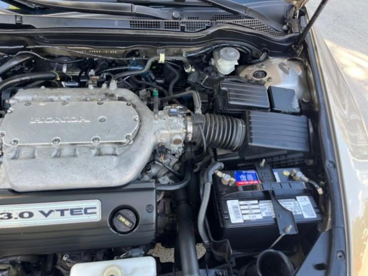 2003 Desert Mist Metallic /Ivory Honda Accord Sdn 26 SERV EX LOW MILES 79,568 (1HGCM66583A) with an 3.0L SOHC 24-Valve VTEC V6 LEV-Certified Engine engine, Automatic transmission, located at 4701 North Dixie Hwy, Pompano Beach, FL, 33064, (954) 422-2889, 26.240938, -80.123474 - OUR WEBPAGE FLORIDACARS1.COM HAS OVER 100 PHOTOS AND FREE CARFAX LINK 2003 HONDA ACCORD EX V-6 ROAD READY 3.0L V6 VIN: 1HGCM66583A061328 NO RECALLS 30 MPG SEDAN 4 DR FLORIDA OWNER 3.0L V6 F SOHC 24V LOW MILES 79,568 GASOLINE POWER LEATHER SEATS FRONT WHEEL DRIVE 26 SERVICE RECORDS POWER SUNROOF Allo - Photo#65