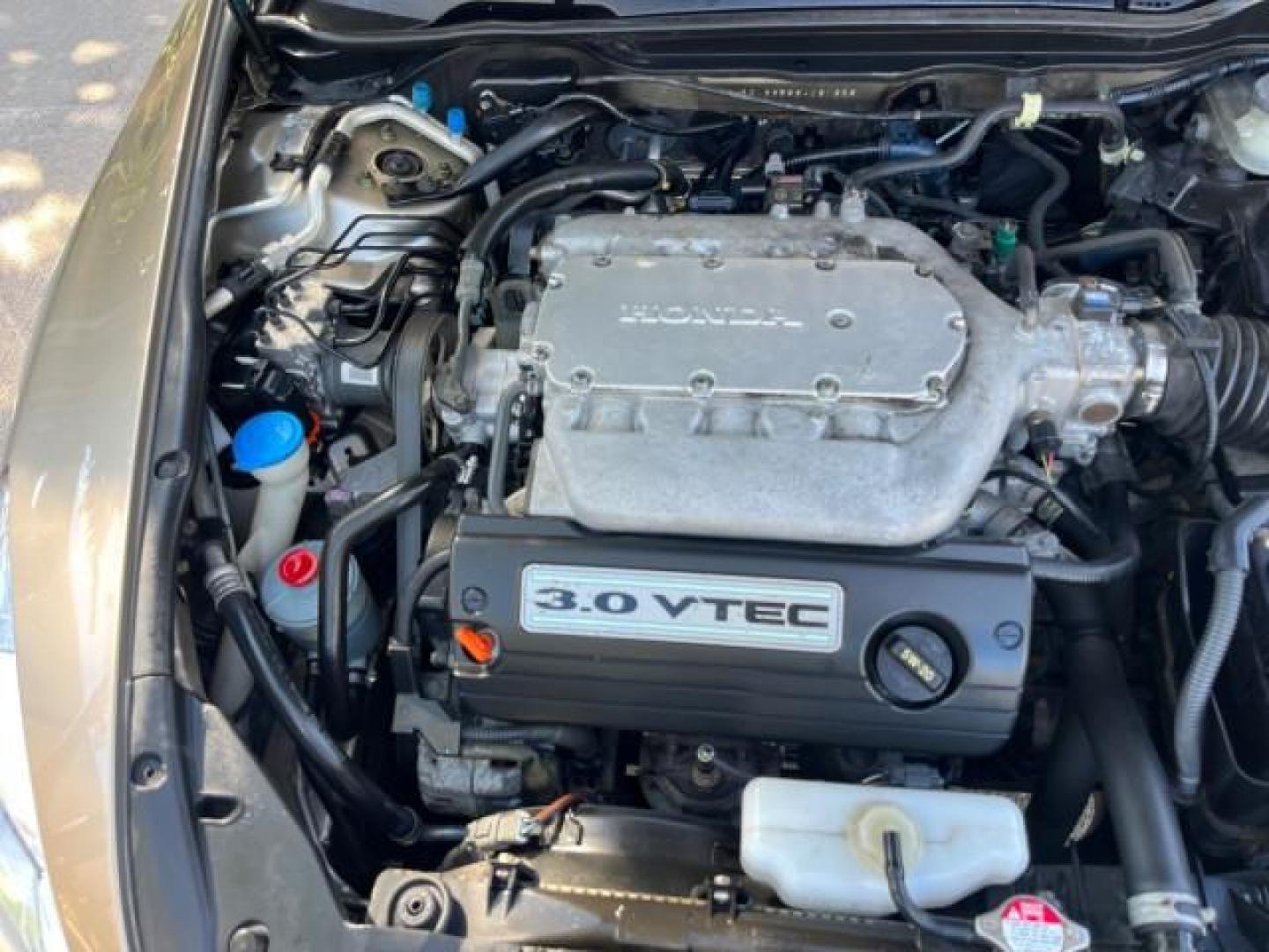 2003 Desert Mist Metallic /Ivory Honda Accord Sdn 26 SERV EX LOW MILES 79,568 (1HGCM66583A) with an 3.0L SOHC 24-Valve VTEC V6 LEV-Certified Engine engine, Automatic transmission, located at 4701 North Dixie Hwy, Pompano Beach, FL, 33064, (954) 422-2889, 26.240938, -80.123474 - OUR WEBPAGE FLORIDACARS1.COM HAS OVER 100 PHOTOS AND FREE CARFAX LINK 2003 HONDA ACCORD EX V-6 ROAD READY 3.0L V6 VIN: 1HGCM66583A061328 NO RECALLS 30 MPG SEDAN 4 DR FLORIDA OWNER 3.0L V6 F SOHC 24V LOW MILES 79,568 GASOLINE POWER LEATHER SEATS FRONT WHEEL DRIVE 26 SERVICE RECORDS POWER SUNROOF Allo - Photo#66