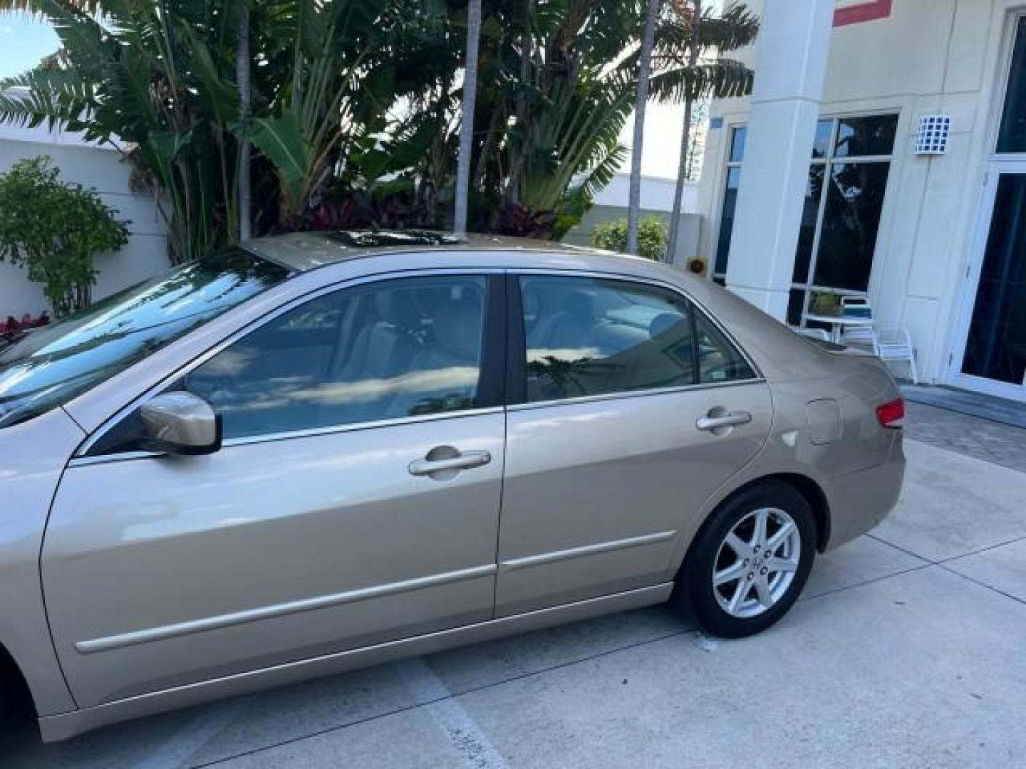 2003 Desert Mist Metallic /Ivory Honda Accord Sdn 26 SERV EX LOW MILES 79,568 (1HGCM66583A) with an 3.0L SOHC 24-Valve VTEC V6 LEV-Certified Engine engine, Automatic transmission, located at 4701 North Dixie Hwy, Pompano Beach, FL, 33064, (954) 422-2889, 26.240938, -80.123474 - OUR WEBPAGE FLORIDACARS1.COM HAS OVER 100 PHOTOS AND FREE CARFAX LINK 2003 HONDA ACCORD EX V-6 ROAD READY 3.0L V6 VIN: 1HGCM66583A061328 NO RECALLS 30 MPG SEDAN 4 DR FLORIDA OWNER 3.0L V6 F SOHC 24V LOW MILES 79,568 GASOLINE POWER LEATHER SEATS FRONT WHEEL DRIVE 26 SERVICE RECORDS POWER SUNROOF Allo - Photo#77