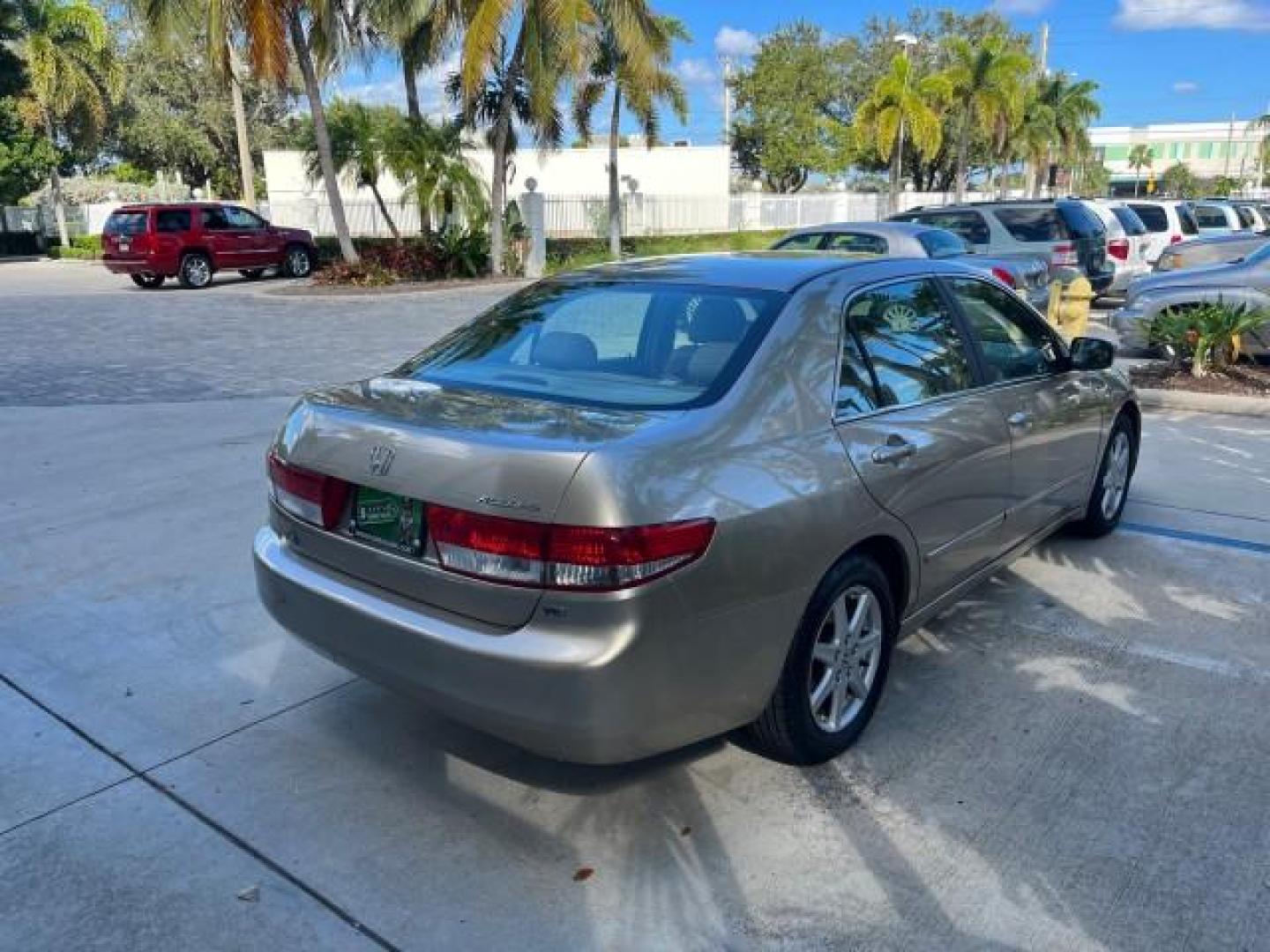 2003 Desert Mist Metallic /Ivory Honda Accord Sdn 26 SERV EX LOW MILES 79,568 (1HGCM66583A) with an 3.0L SOHC 24-Valve VTEC V6 LEV-Certified Engine engine, Automatic transmission, located at 4701 North Dixie Hwy, Pompano Beach, FL, 33064, (954) 422-2889, 26.240938, -80.123474 - OUR WEBPAGE FLORIDACARS1.COM HAS OVER 100 PHOTOS AND FREE CARFAX LINK 2003 HONDA ACCORD EX V-6 ROAD READY 3.0L V6 VIN: 1HGCM66583A061328 NO RECALLS 30 MPG SEDAN 4 DR FLORIDA OWNER 3.0L V6 F SOHC 24V LOW MILES 79,568 GASOLINE POWER LEATHER SEATS FRONT WHEEL DRIVE 26 SERVICE RECORDS POWER SUNROOF Allo - Photo#7